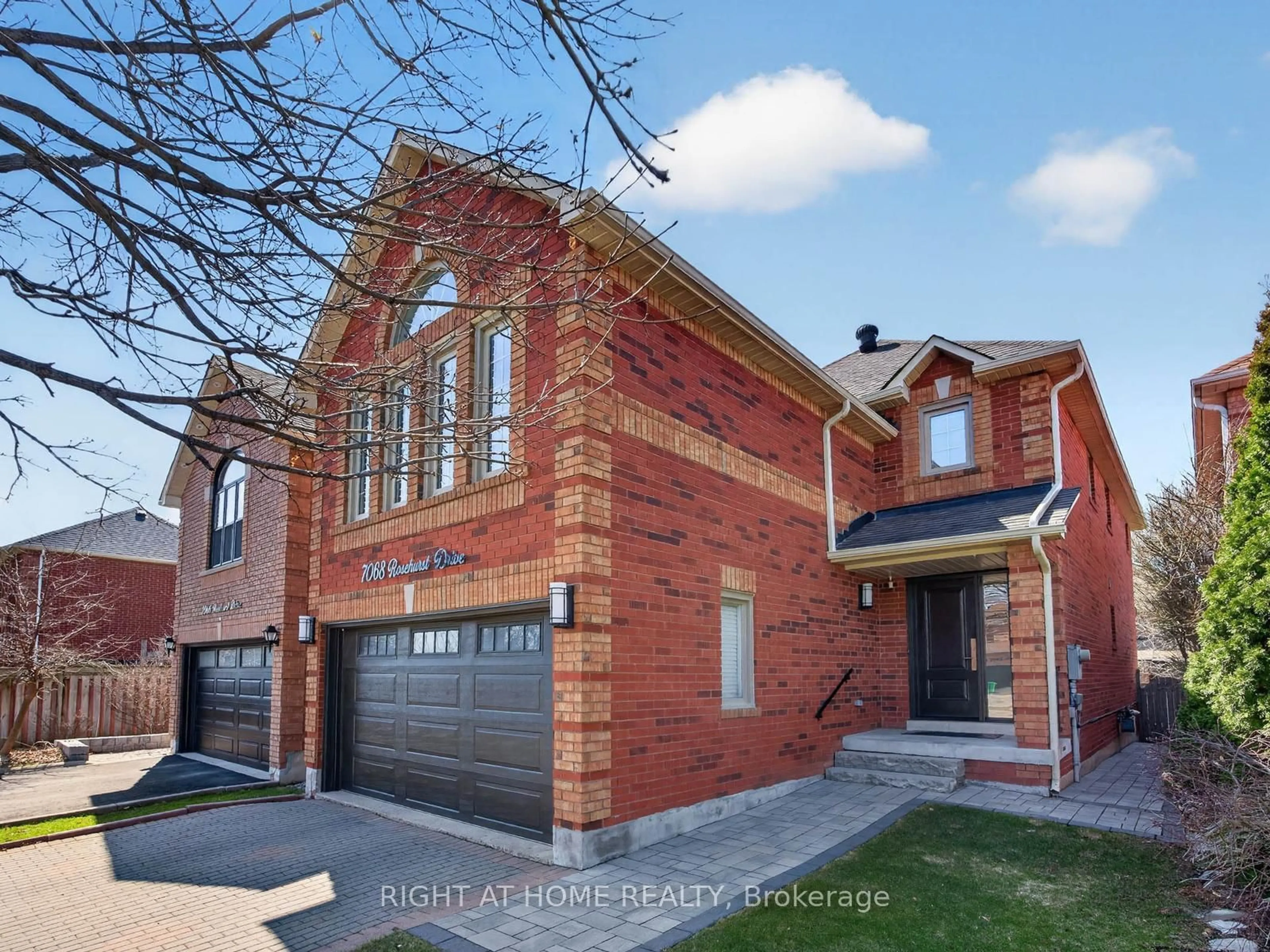 Home with brick exterior material, street for 7068 Rosehurst Dr, Mississauga Ontario L5N 6Y8