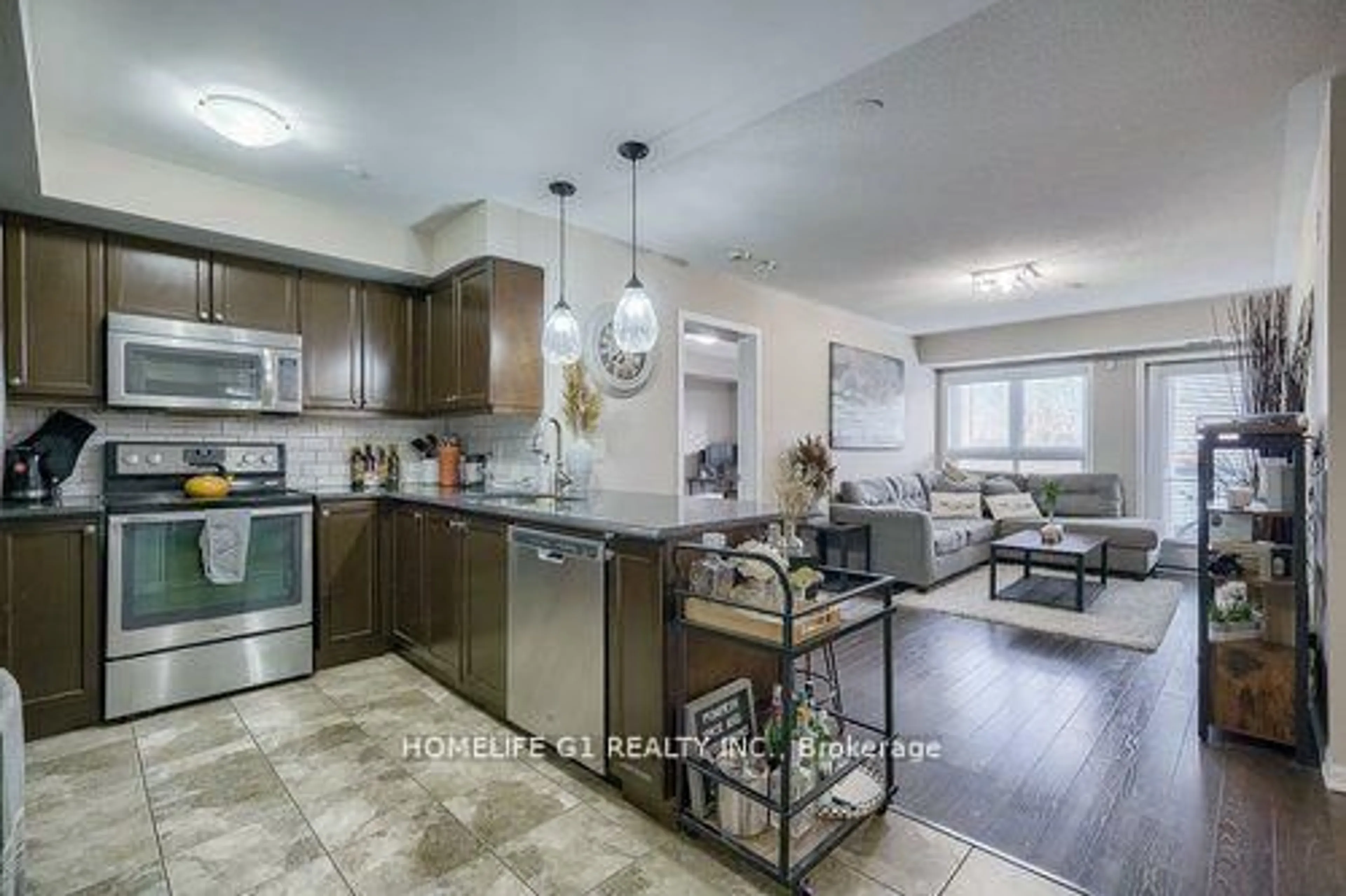Open concept kitchen, unknown for 1045 Nadalin Hts #106, Milton Ontario L9T 8R5