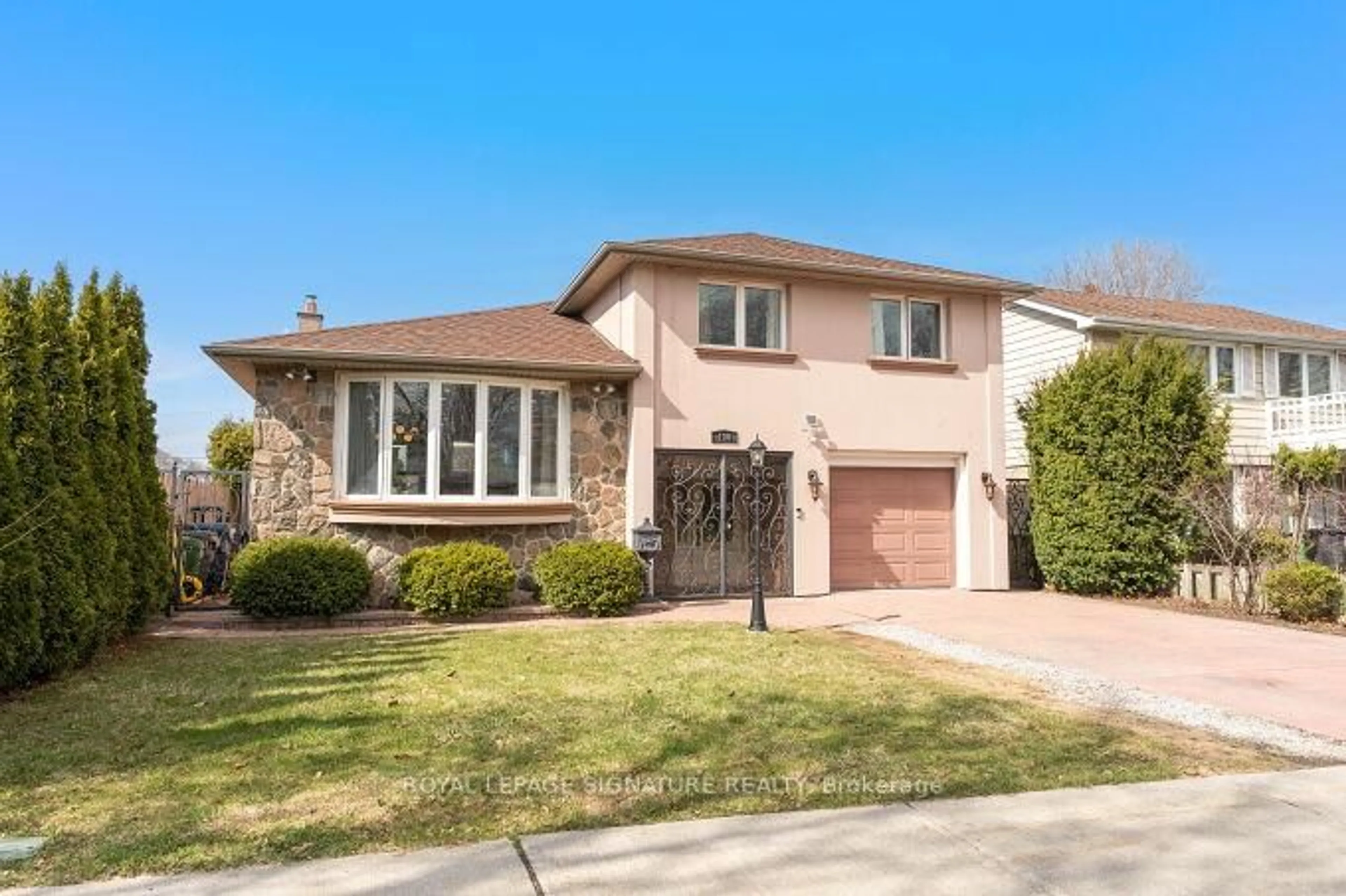 Home with brick exterior material, street for 130 Carsbrooke Rd, Toronto Ontario M9C 3C8