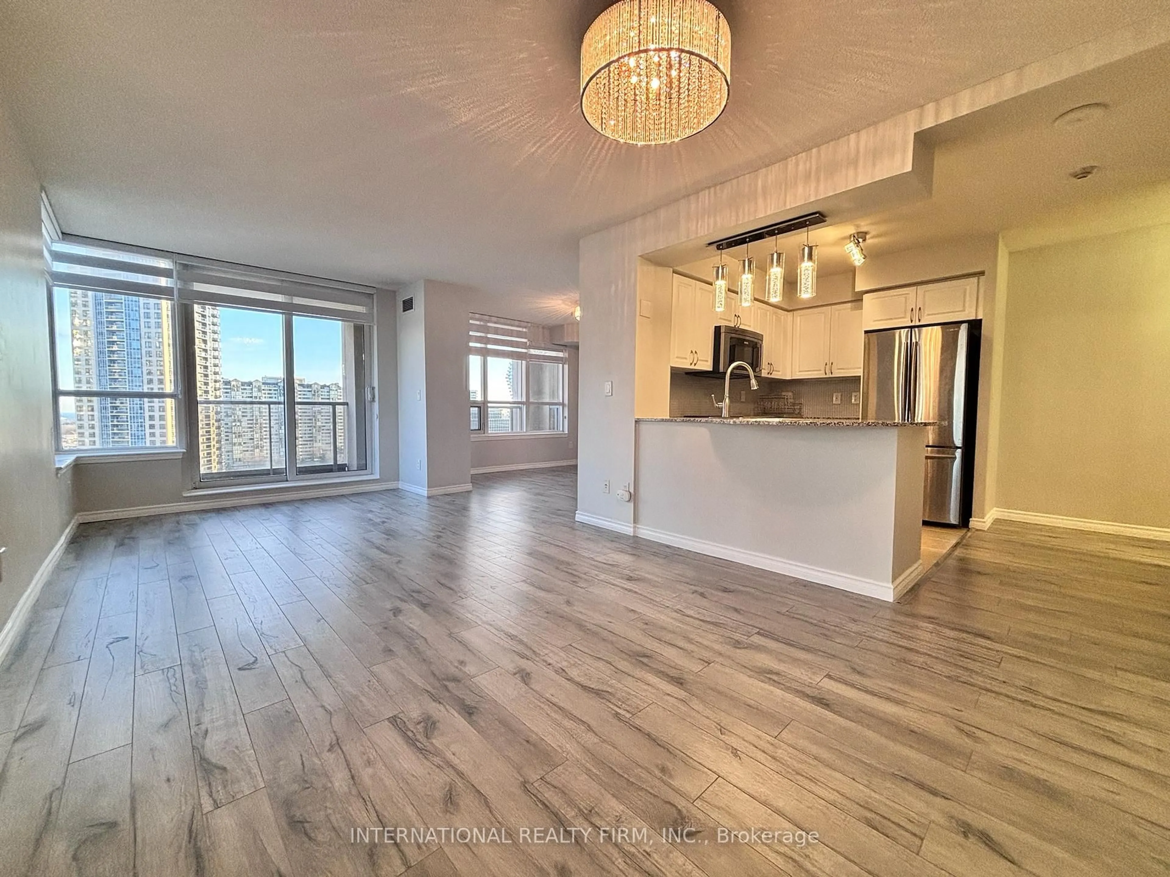 Open concept kitchen, wood/laminate floor for 4080 Living Arts Dr #1511, Mississauga Ontario L5B 4N3