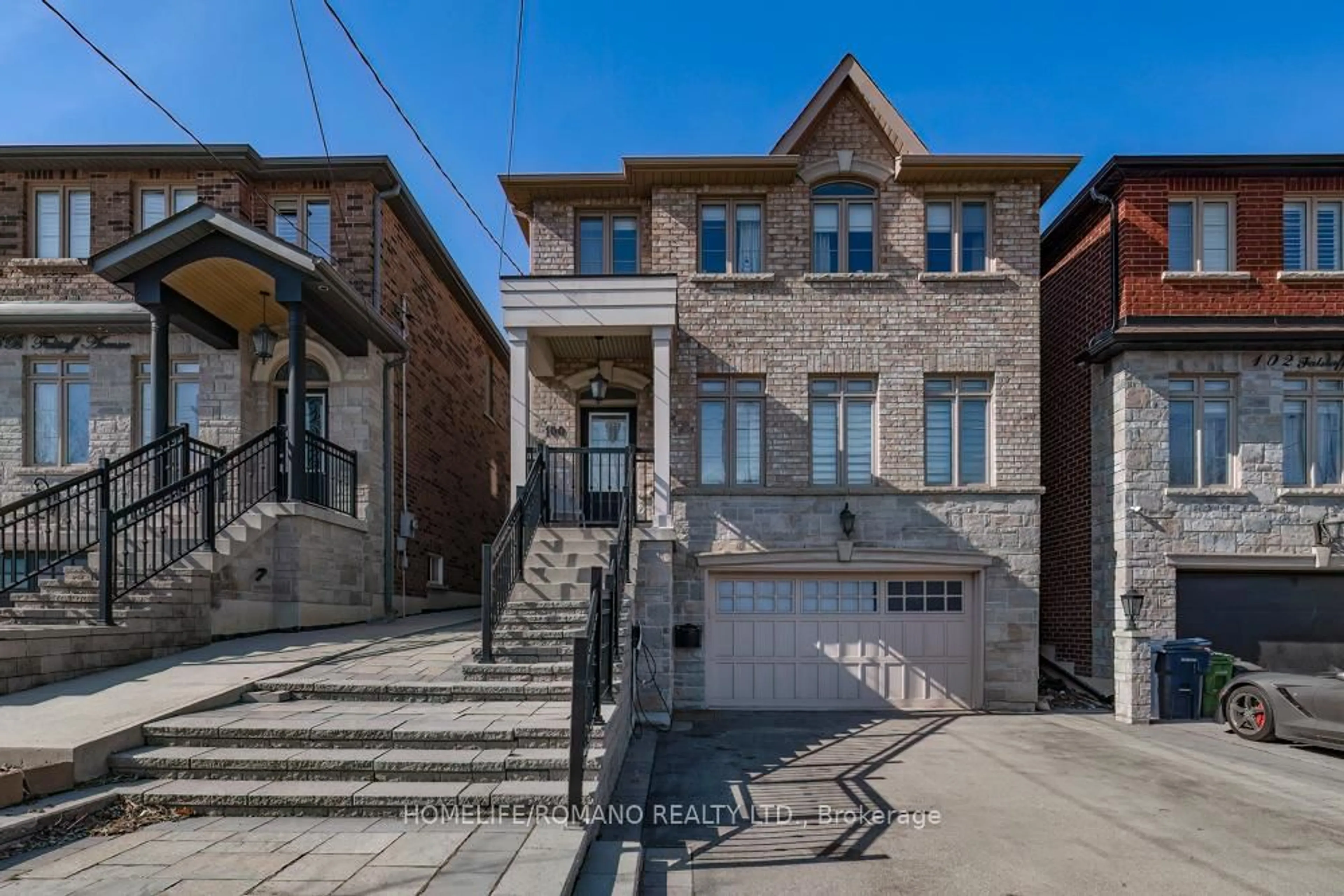 Home with brick exterior material, street for 100 Falstaff Ave, Toronto Ontario M6L 2E4