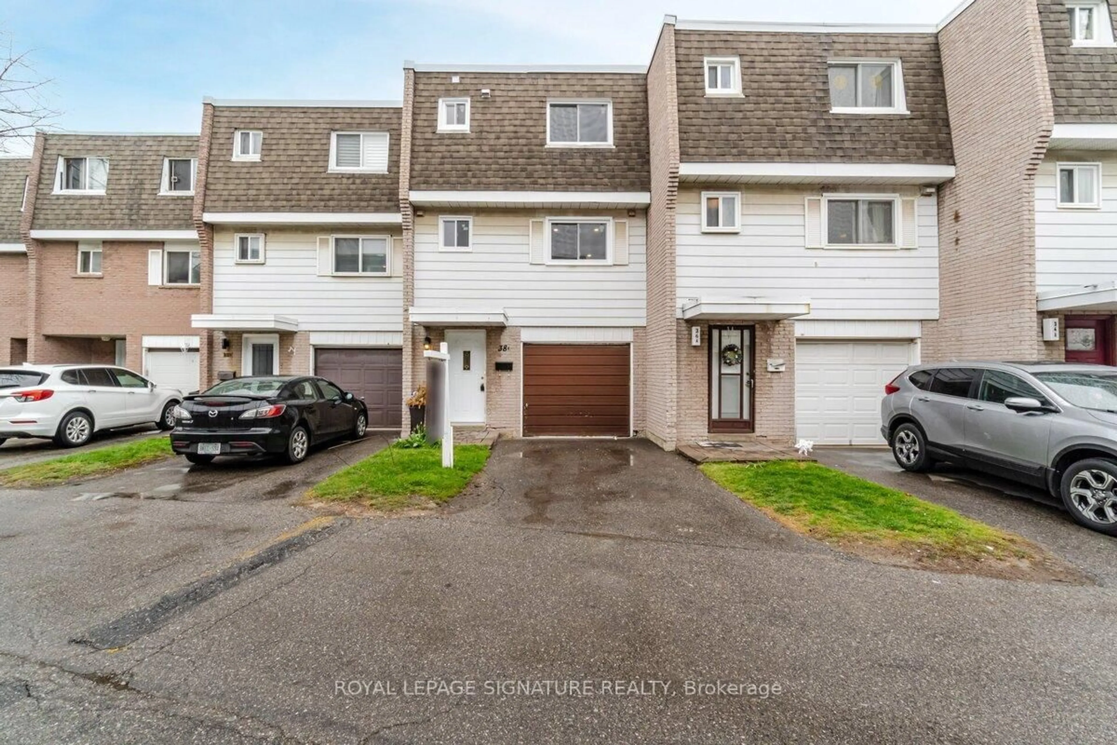 A pic from outside/outdoor area/front of a property/back of a property/a pic from drone, street for 830 Westlock Rd #38A, Mississauga Ontario L5C 1K6