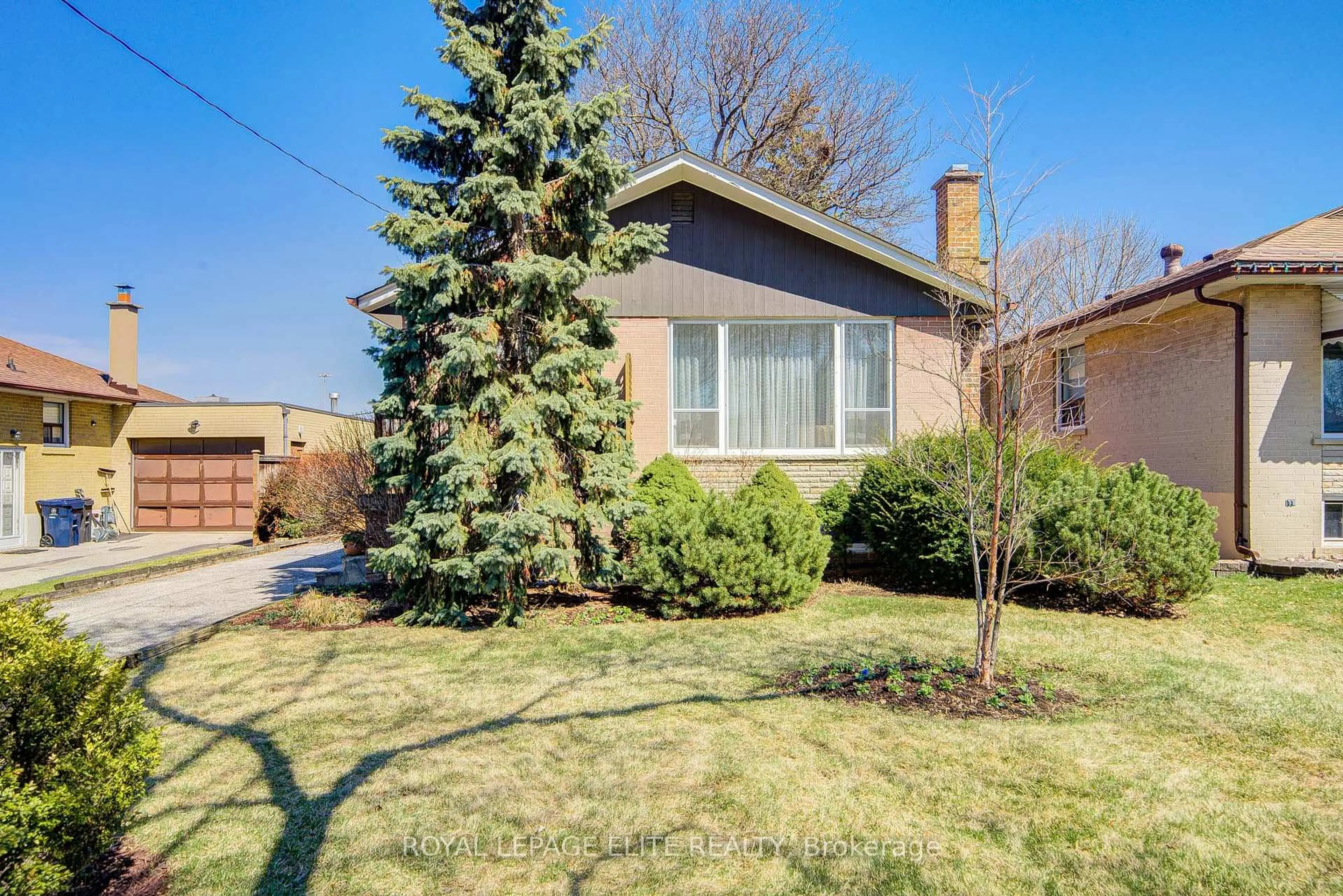 Home with brick exterior material, street for 27 Firestone Rd. Rd, Toronto Ontario M9C 4N1