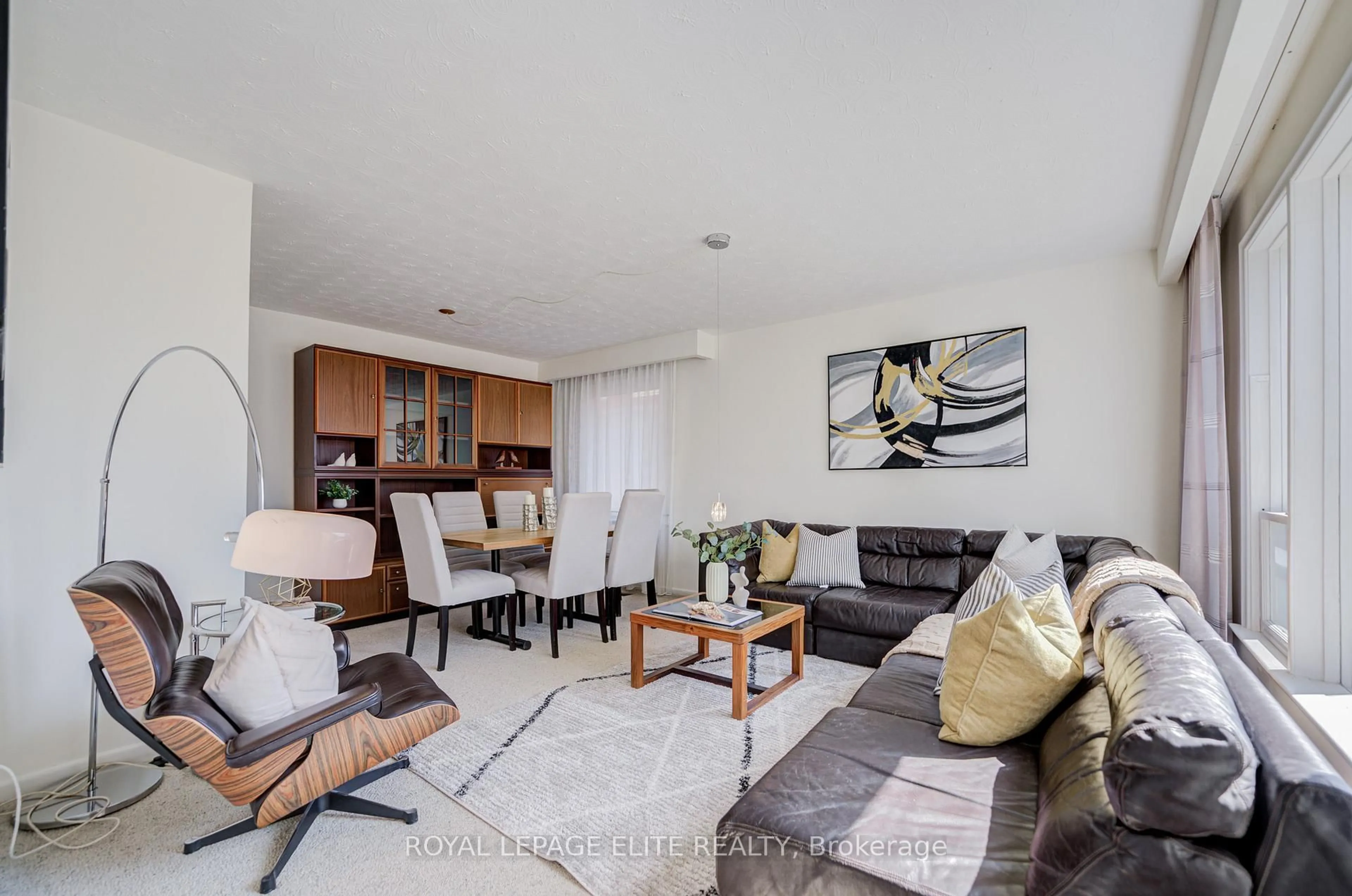 Living room with furniture, unknown for 27 Firestone Rd. Rd, Toronto Ontario M9C 4N1