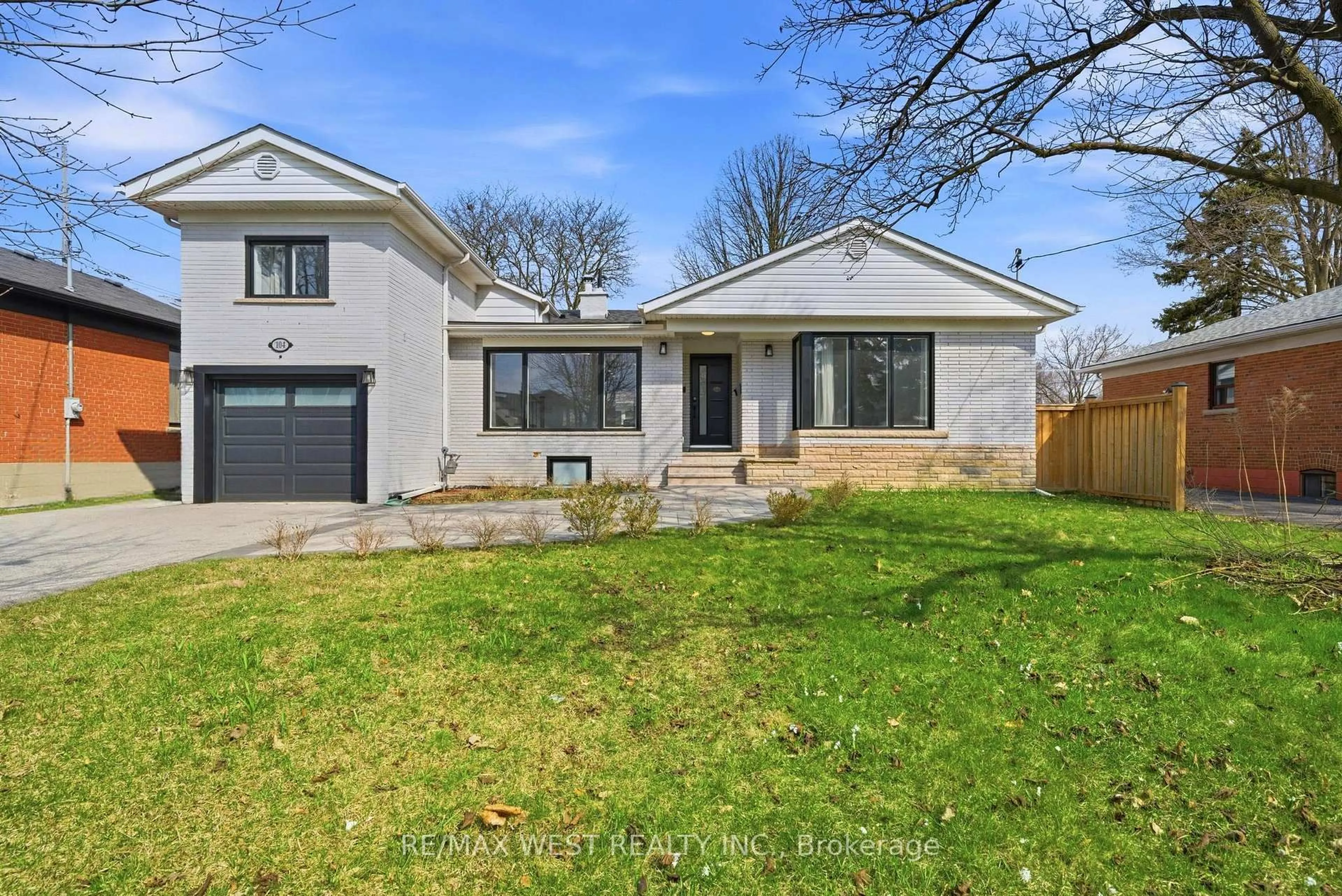 Home with brick exterior material, street for 104 Great Oak Dr, Toronto Ontario M9A 1N5