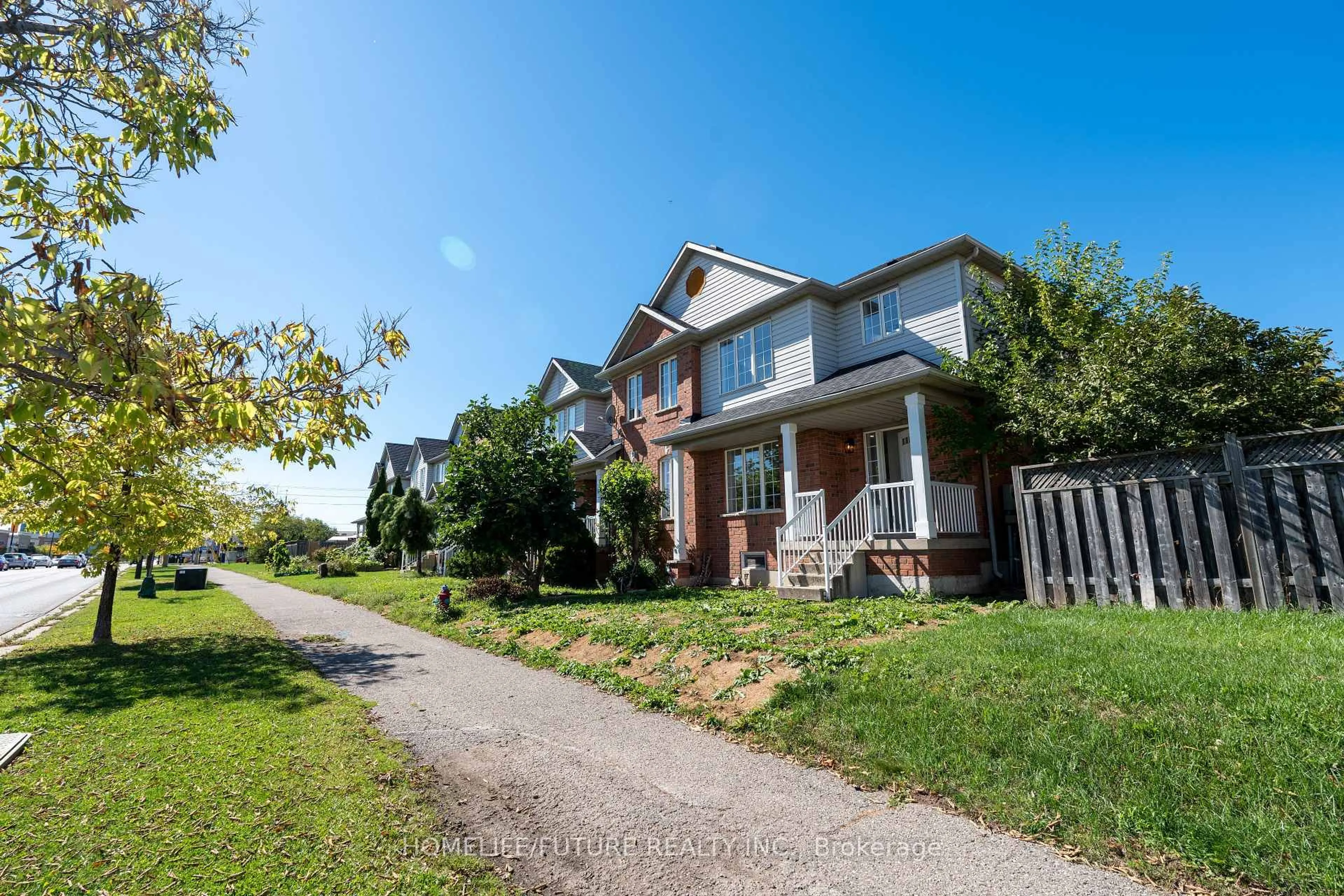 Home with brick exterior material, street for 136 Manley Lane, Milton Ontario L9T 5N9