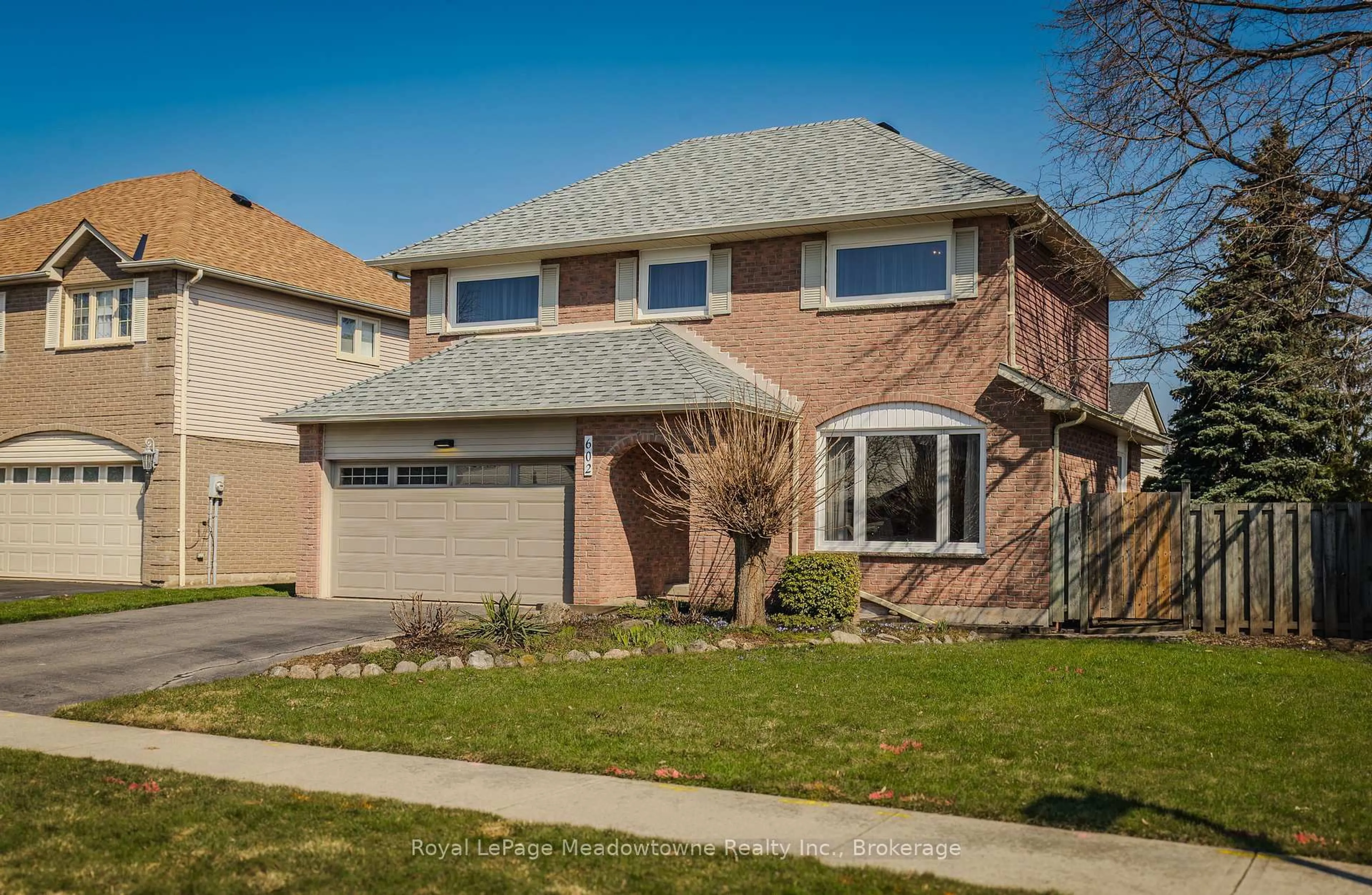 Home with brick exterior material, street for 602 Hawthorne Cres, Milton Ontario L9T 4N8