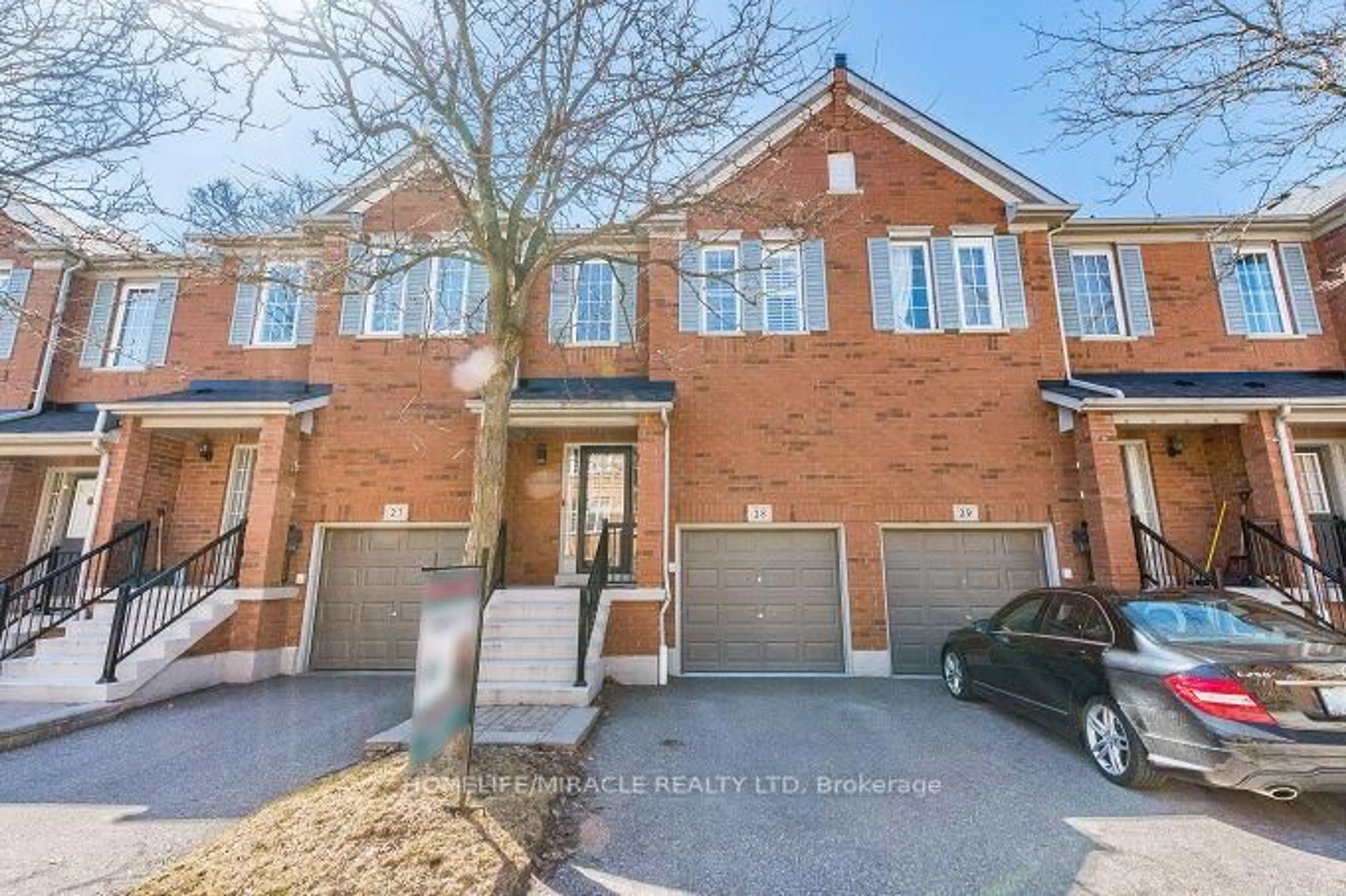 Home with brick exterior material, street for 5530 Glen Erin Dr #28, Mississauga Ontario L5M 6E8