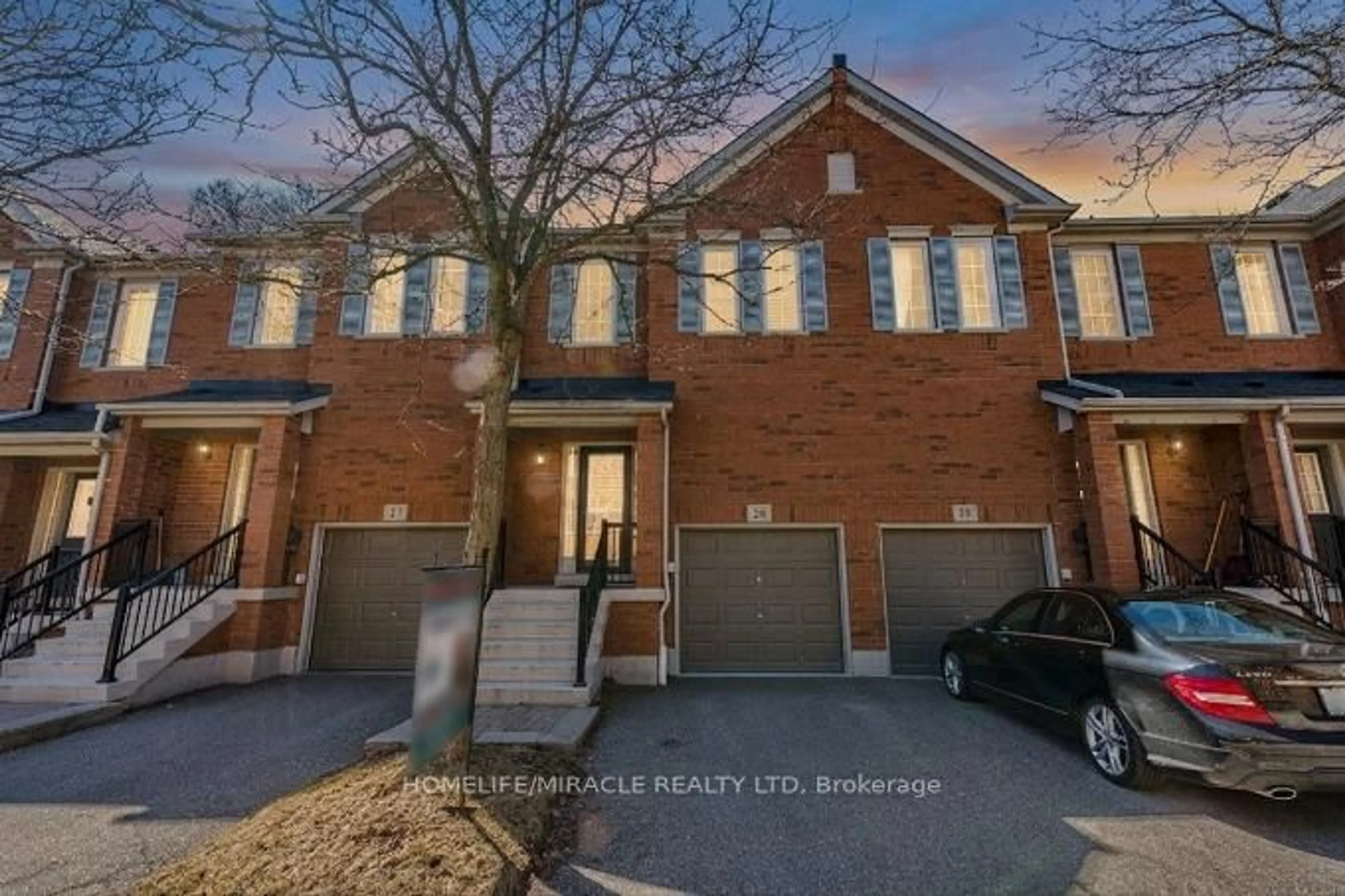 Home with brick exterior material, street for 5530 Glen Erin Dr #28, Mississauga Ontario L5M 6E8