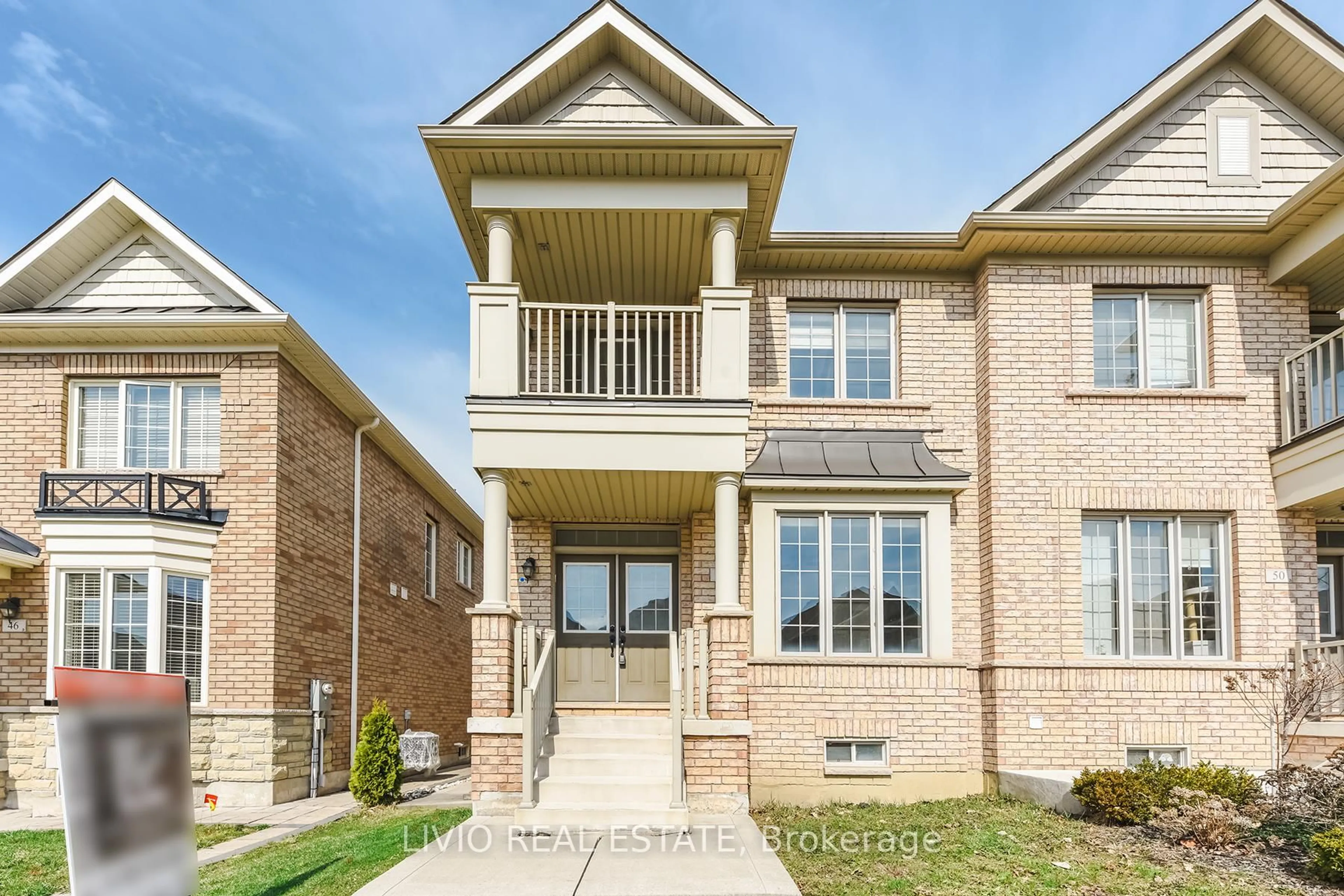 Home with brick exterior material, street for 48 Bonnie Braes Dr, Brampton Ontario L6Y 0Y5