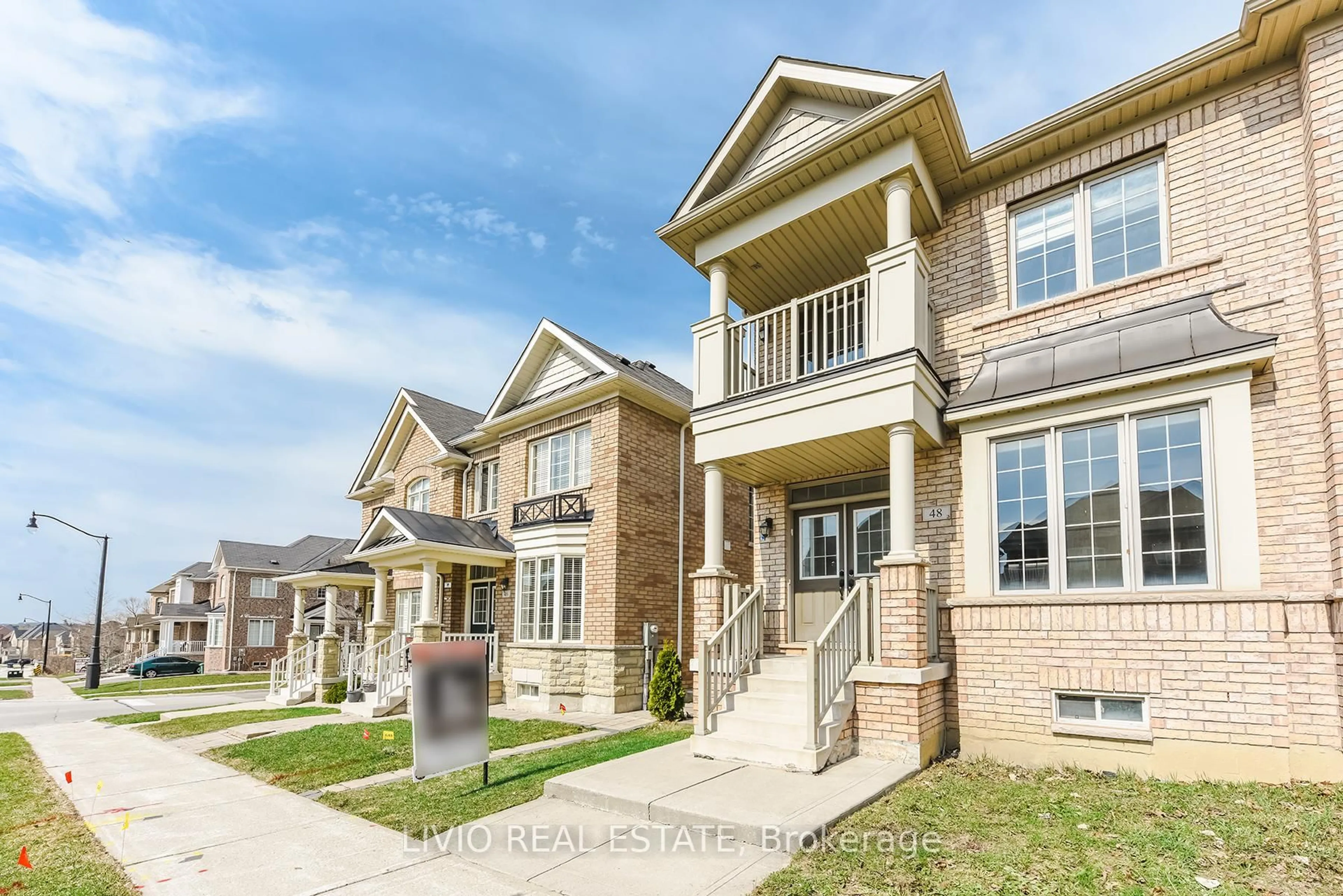 Home with brick exterior material, street for 48 Bonnie Braes Dr, Brampton Ontario L6Y 0Y5