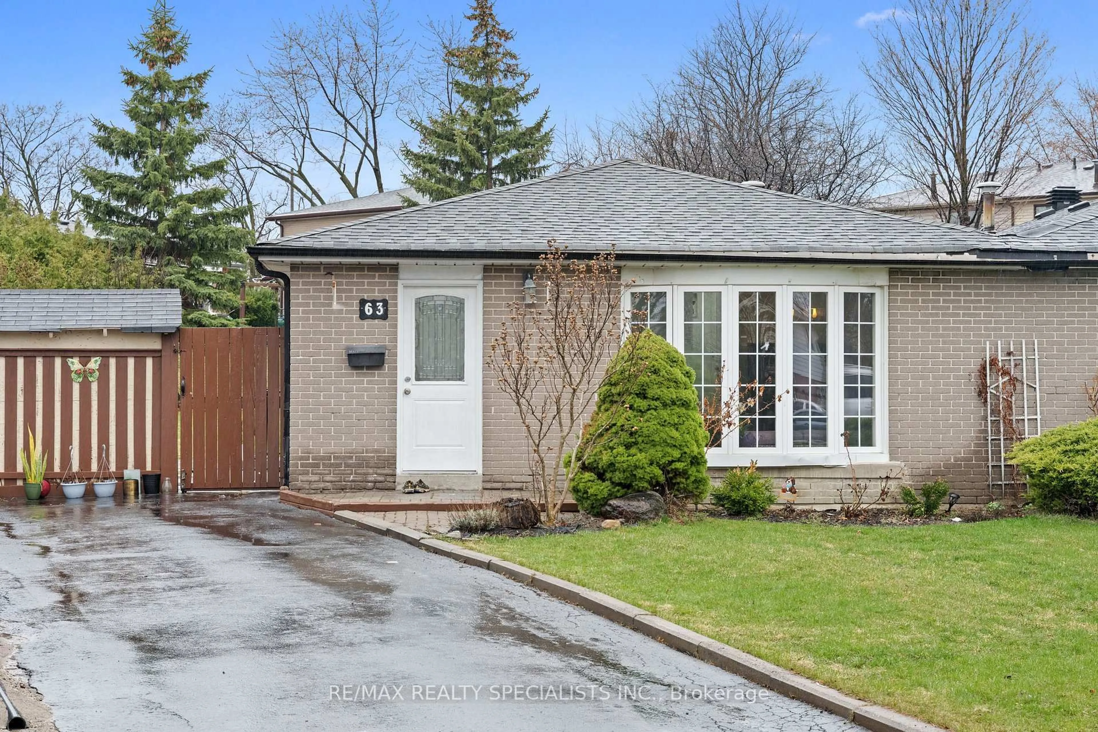 Home with brick exterior material, street for 63 Davenport Cres, Brampton Ontario L6T 3L5