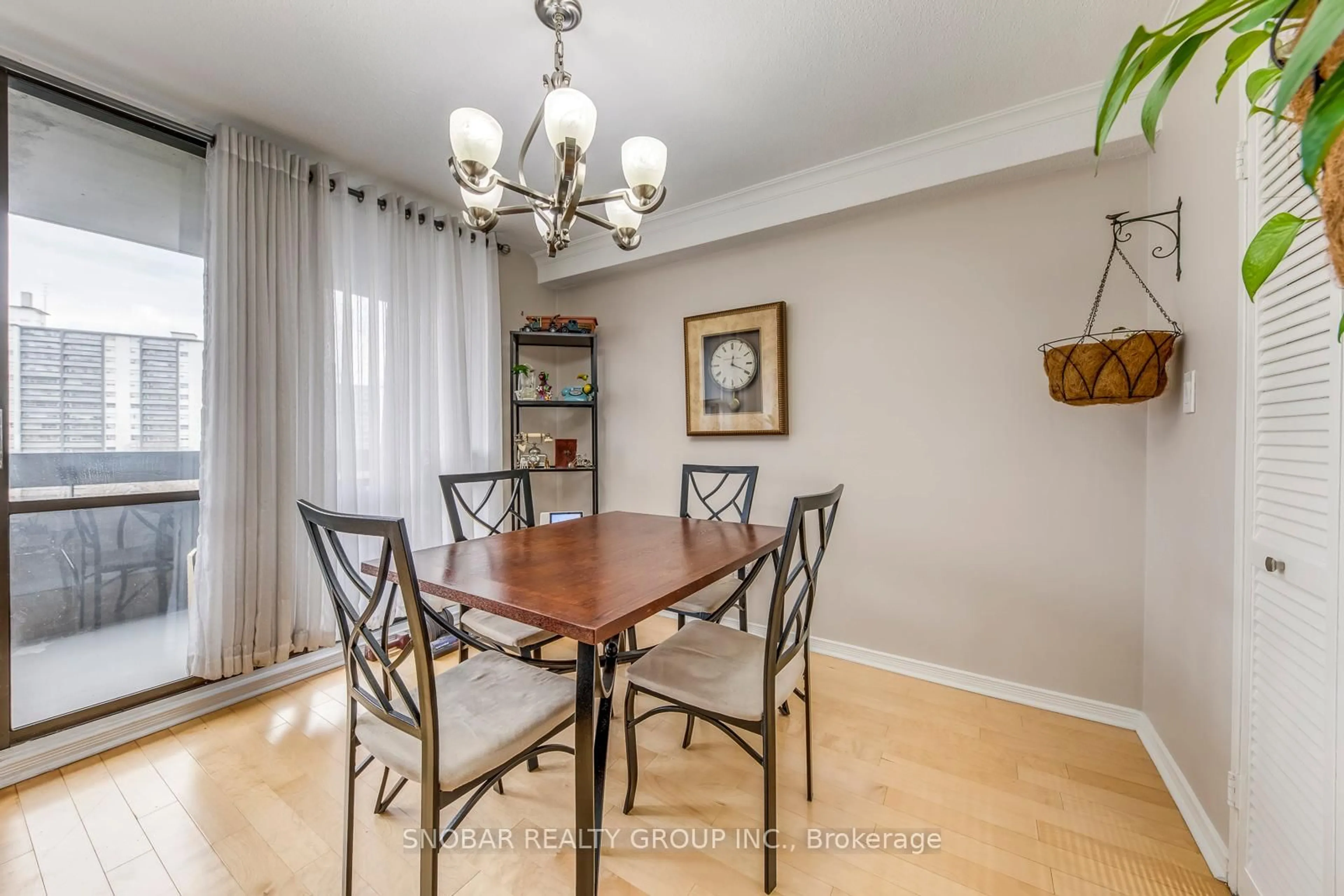 Dining room, wood/laminate floor for 11 Wincott Dr #810, Toronto Ontario M9R 2R9