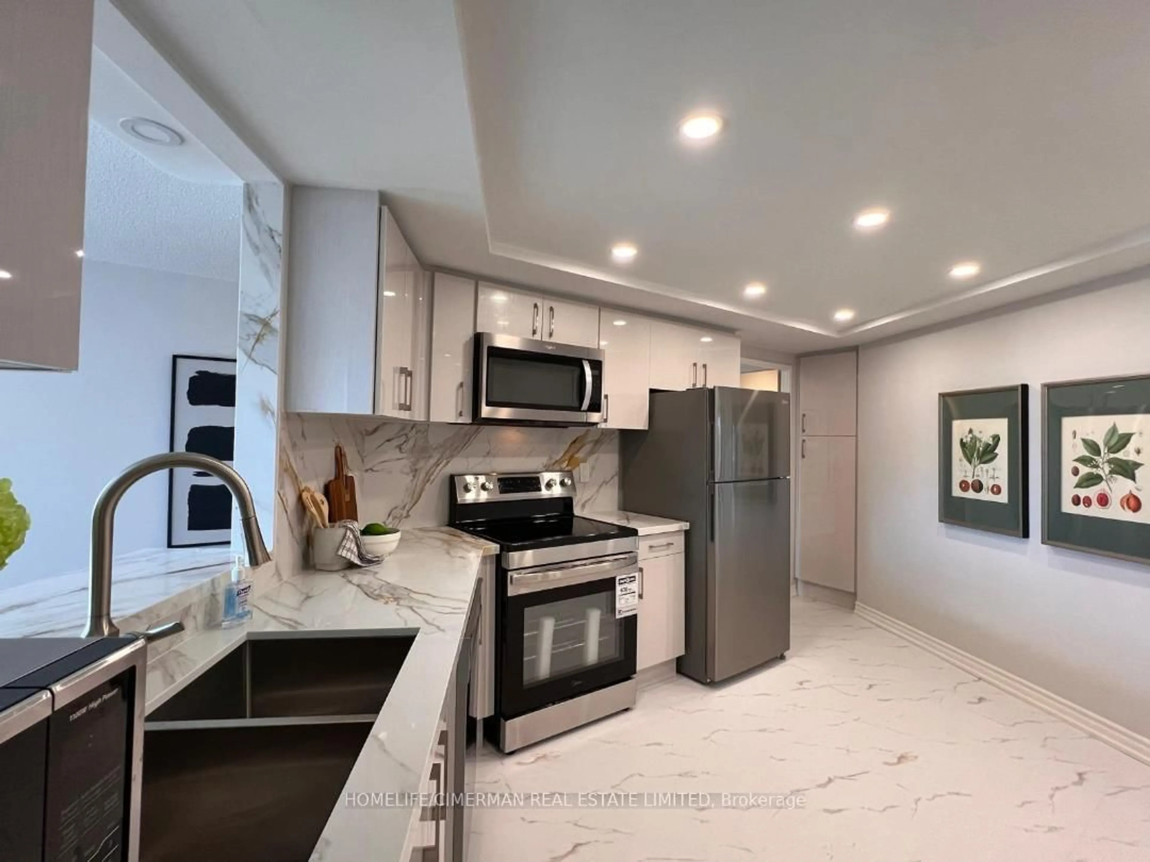 Open concept kitchen, ceramic/tile floor for 2010 Islington Ave #601, Toronto Ontario M9P 3S8