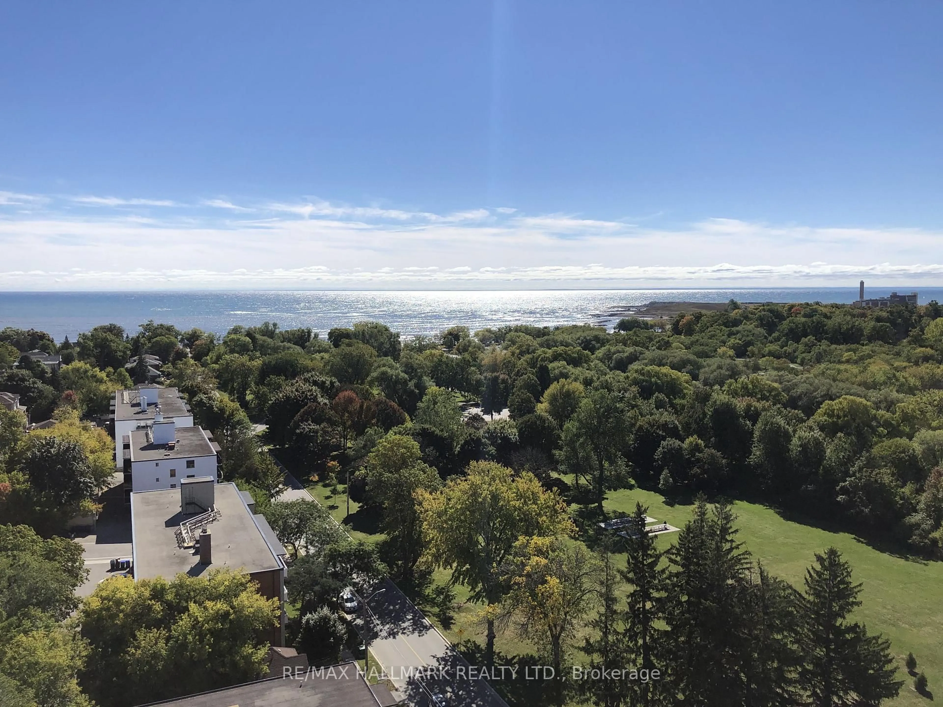 A pic from outside/outdoor area/front of a property/back of a property/a pic from drone, water/lake/river/ocean view for 3865 Lake Shore Blvd #1301, Toronto Ontario M8W 0A2