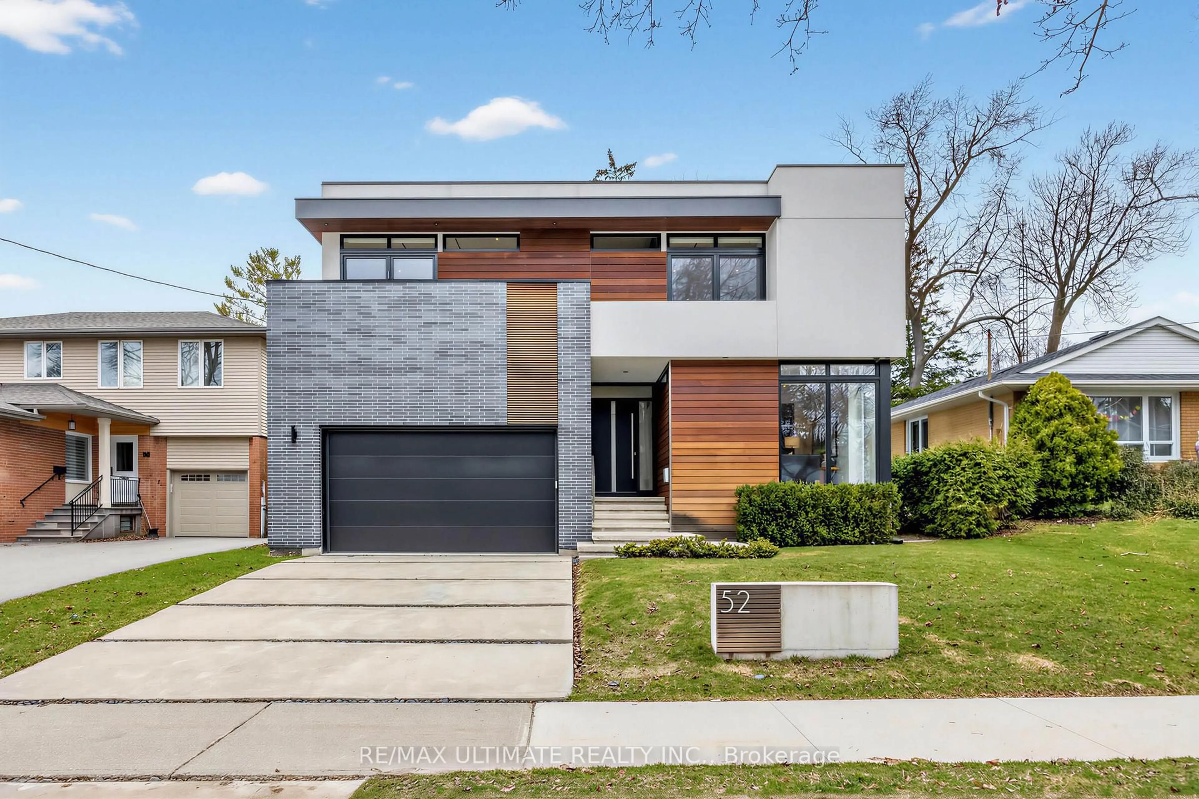 Home with brick exterior material, street for 52 Burrows Ave, Toronto Ontario M9B 4W7