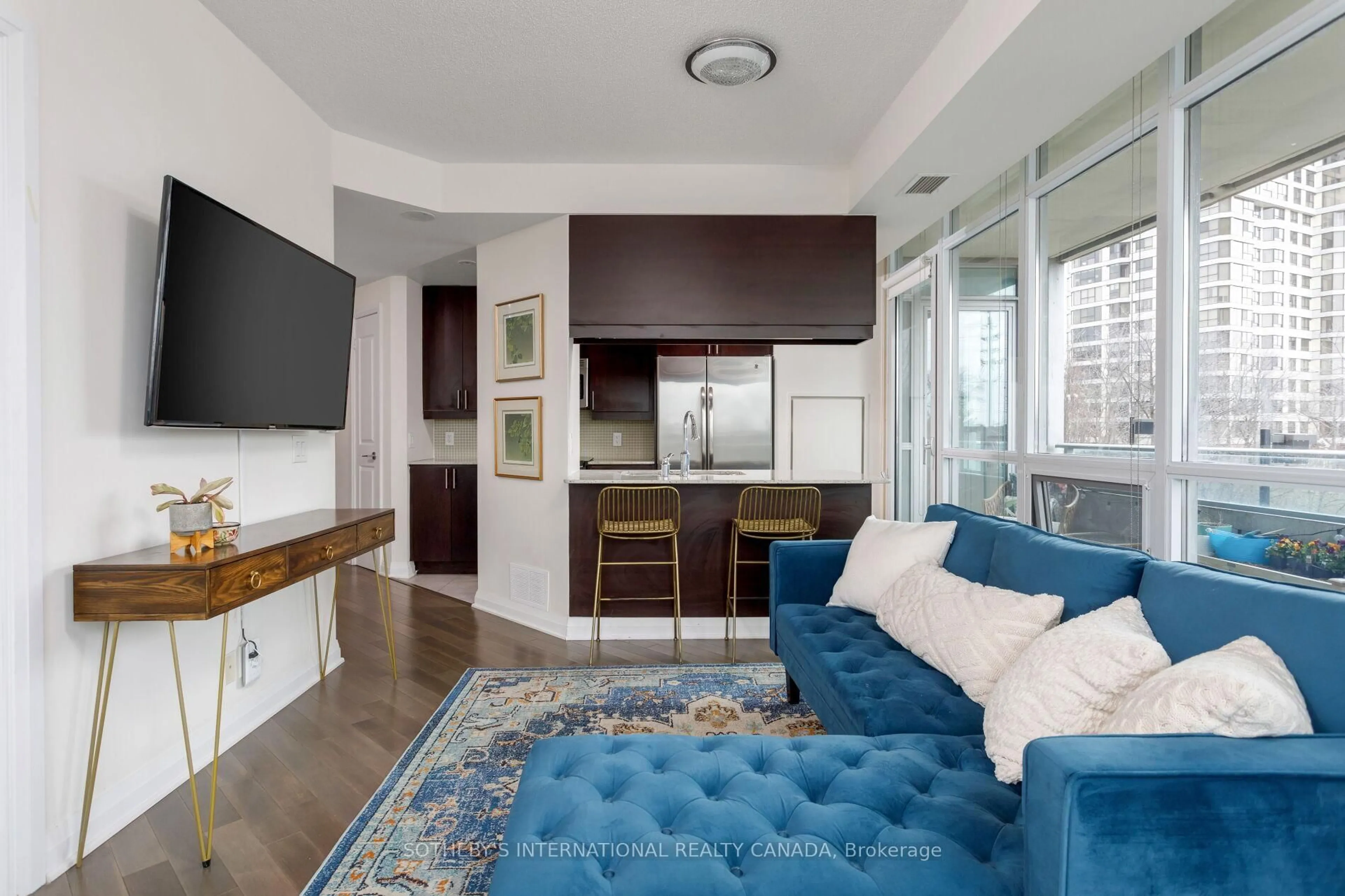 Living room with furniture, unknown for 1055 Southdown Rd #210, Mississauga Ontario L5J 0A3