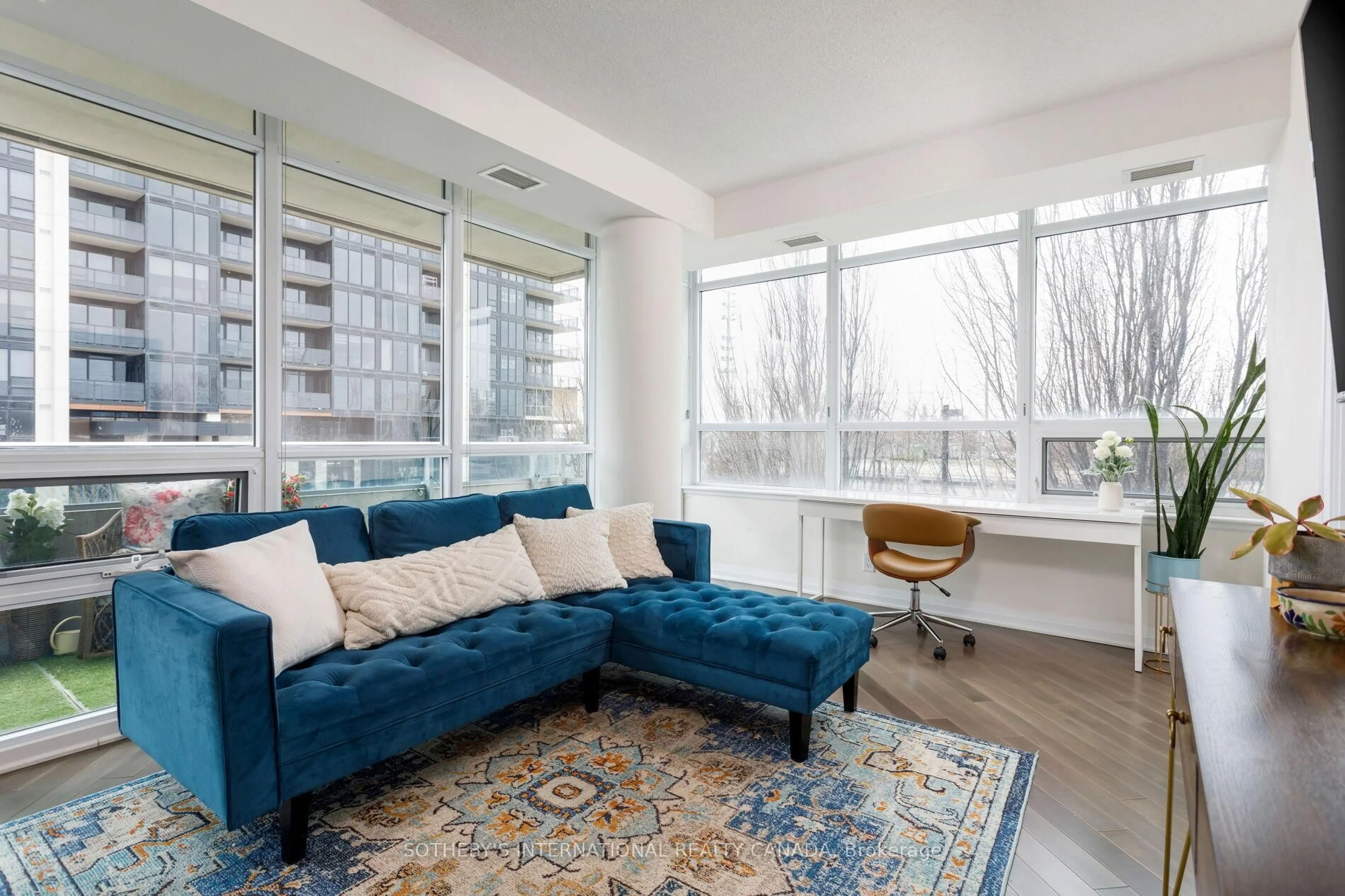 Living room with furniture, unknown for 1055 Southdown Rd #210, Mississauga Ontario L5J 0A3