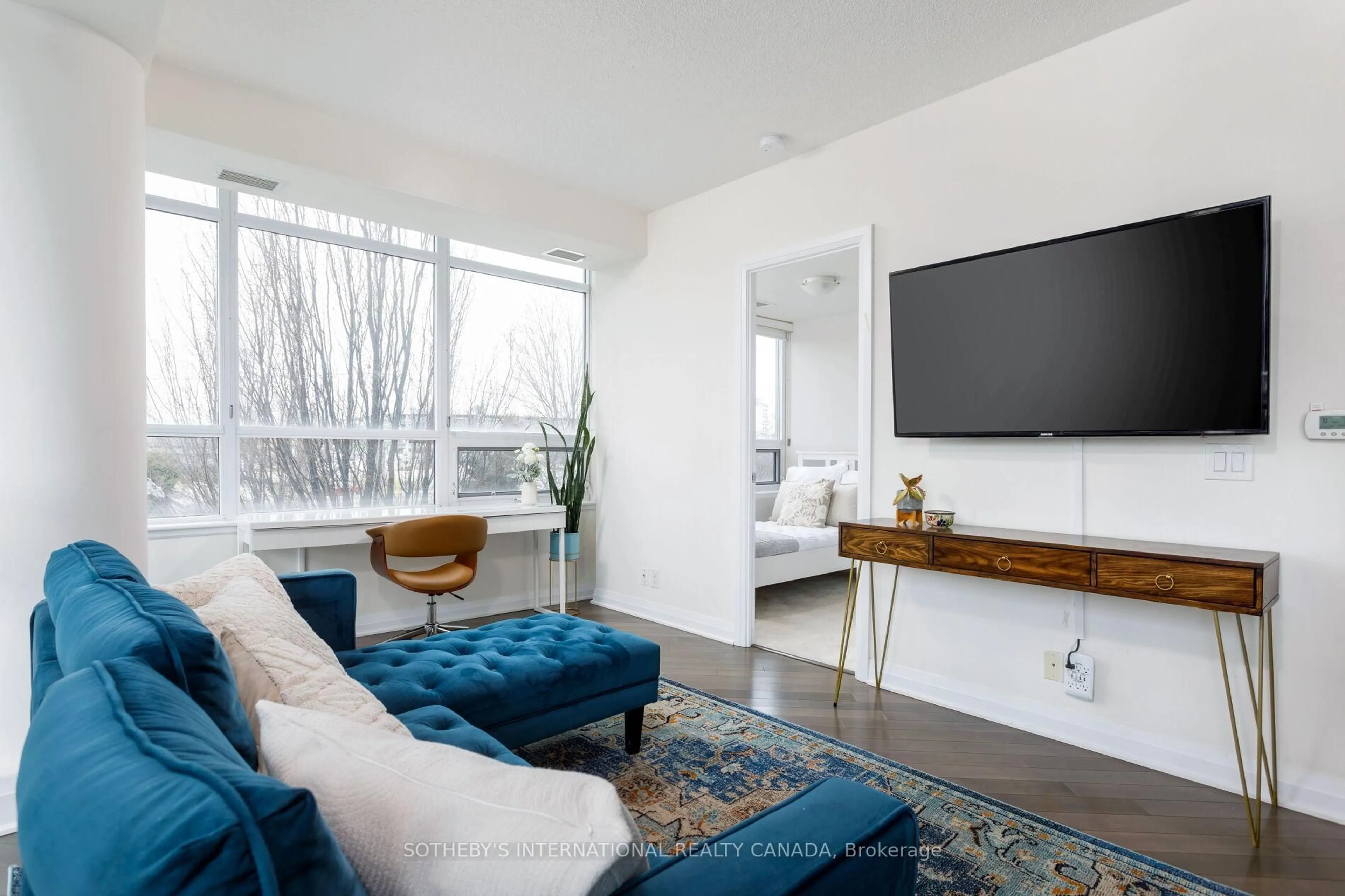 Living room with furniture, unknown for 1055 Southdown Rd #210, Mississauga Ontario L5J 0A3