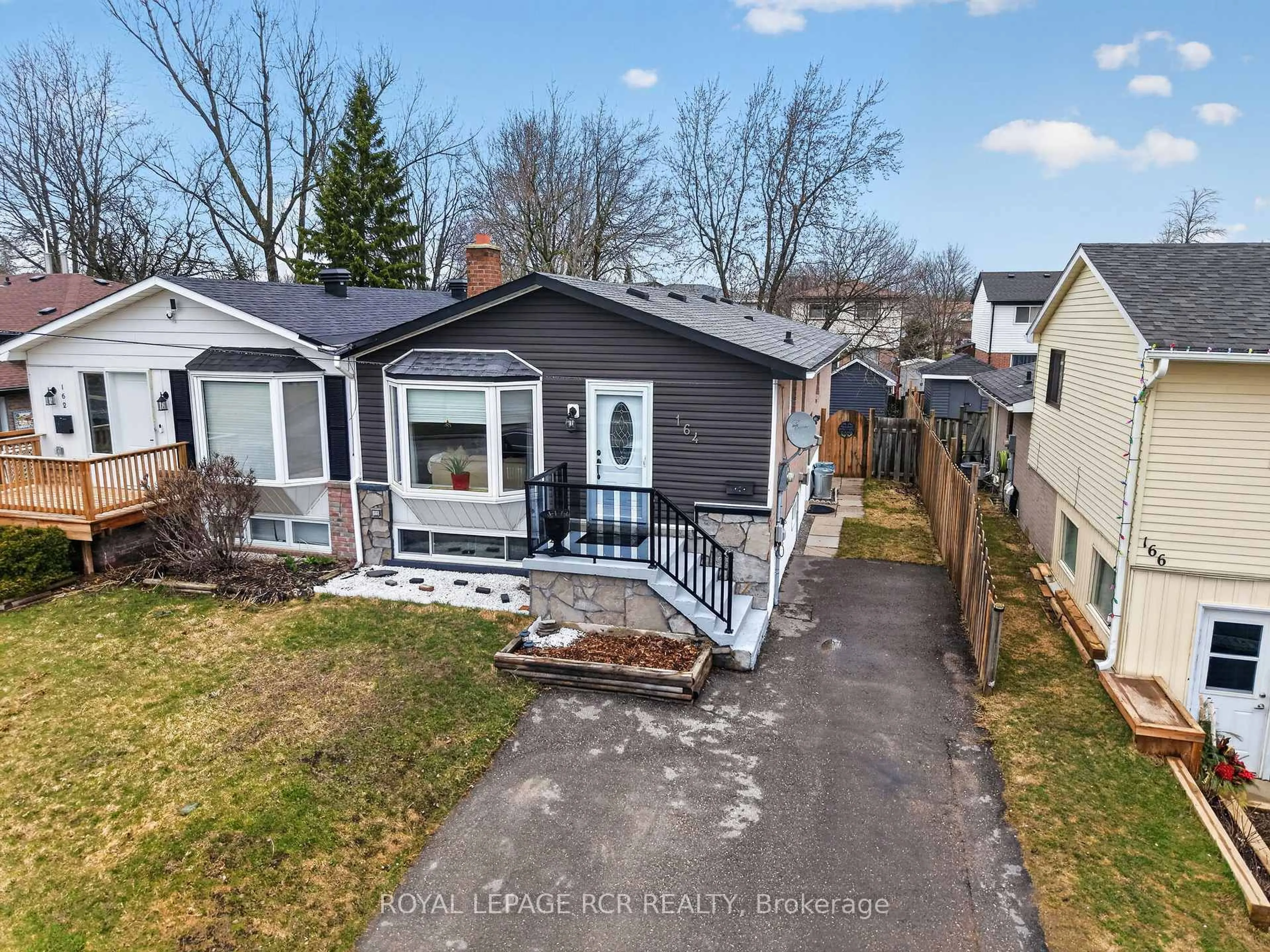 A pic from outside/outdoor area/front of a property/back of a property/a pic from drone, street for 164 Burbank Cres, Orangeville Ontario L9W 3H8
