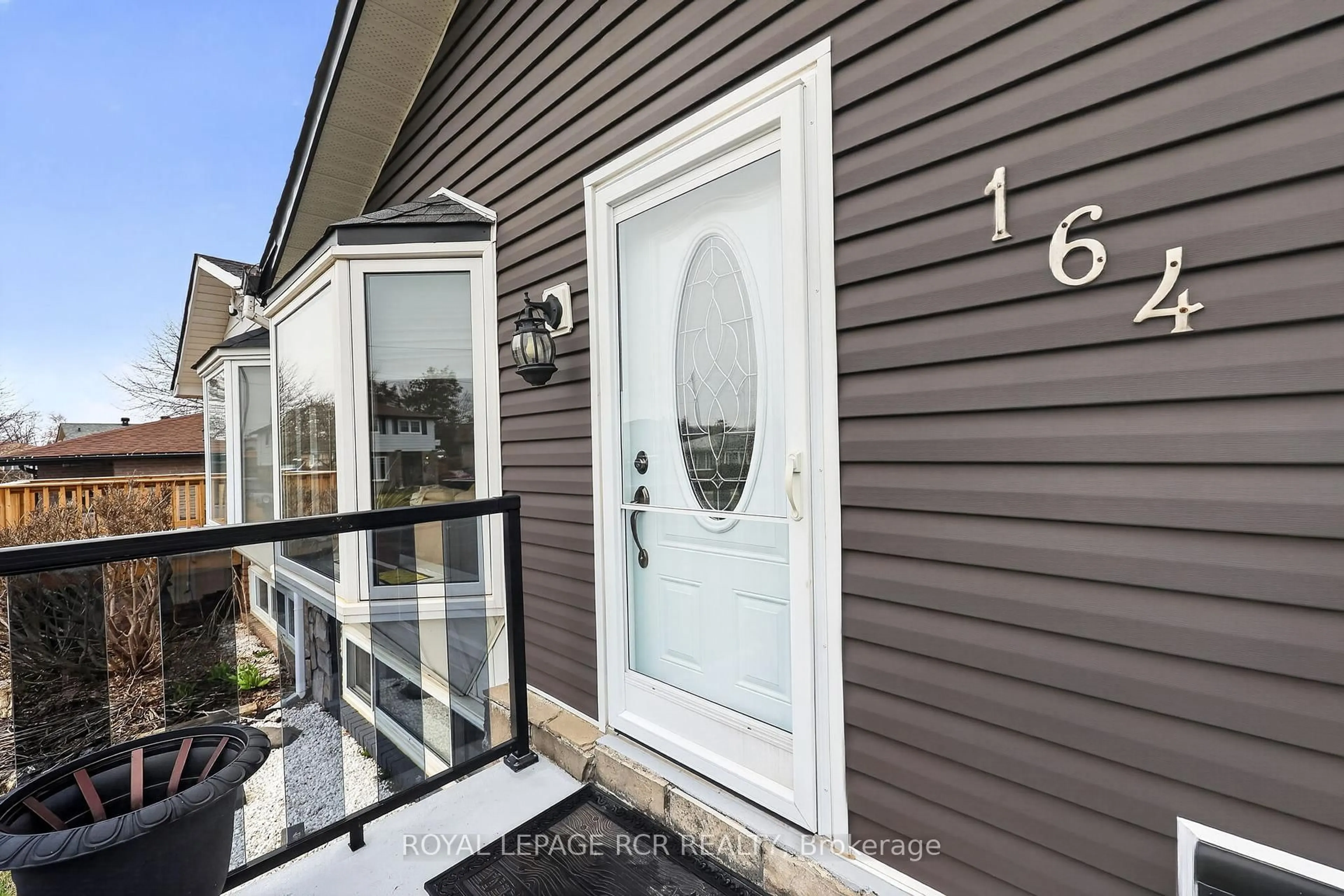 Home with vinyl exterior material, street for 164 Burbank Cres, Orangeville Ontario L9W 3H8