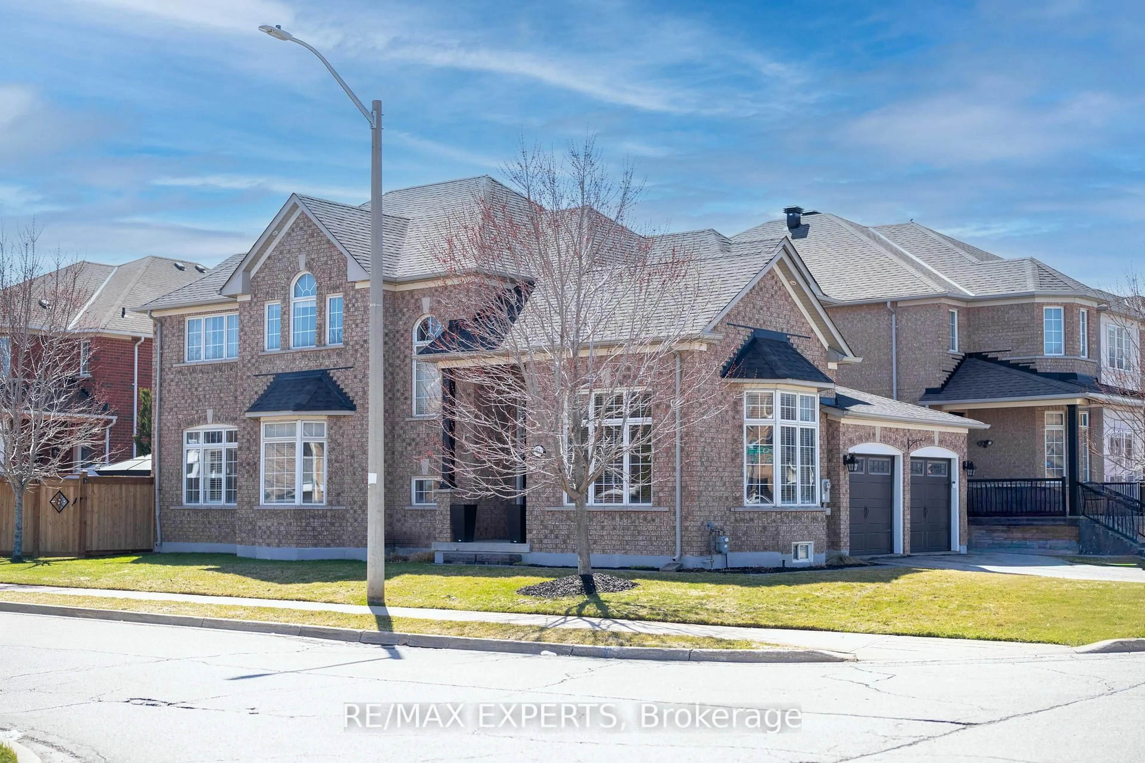 Home with brick exterior material, street for 52 Goreridge Cres, Brampton Ontario L6P 1P1