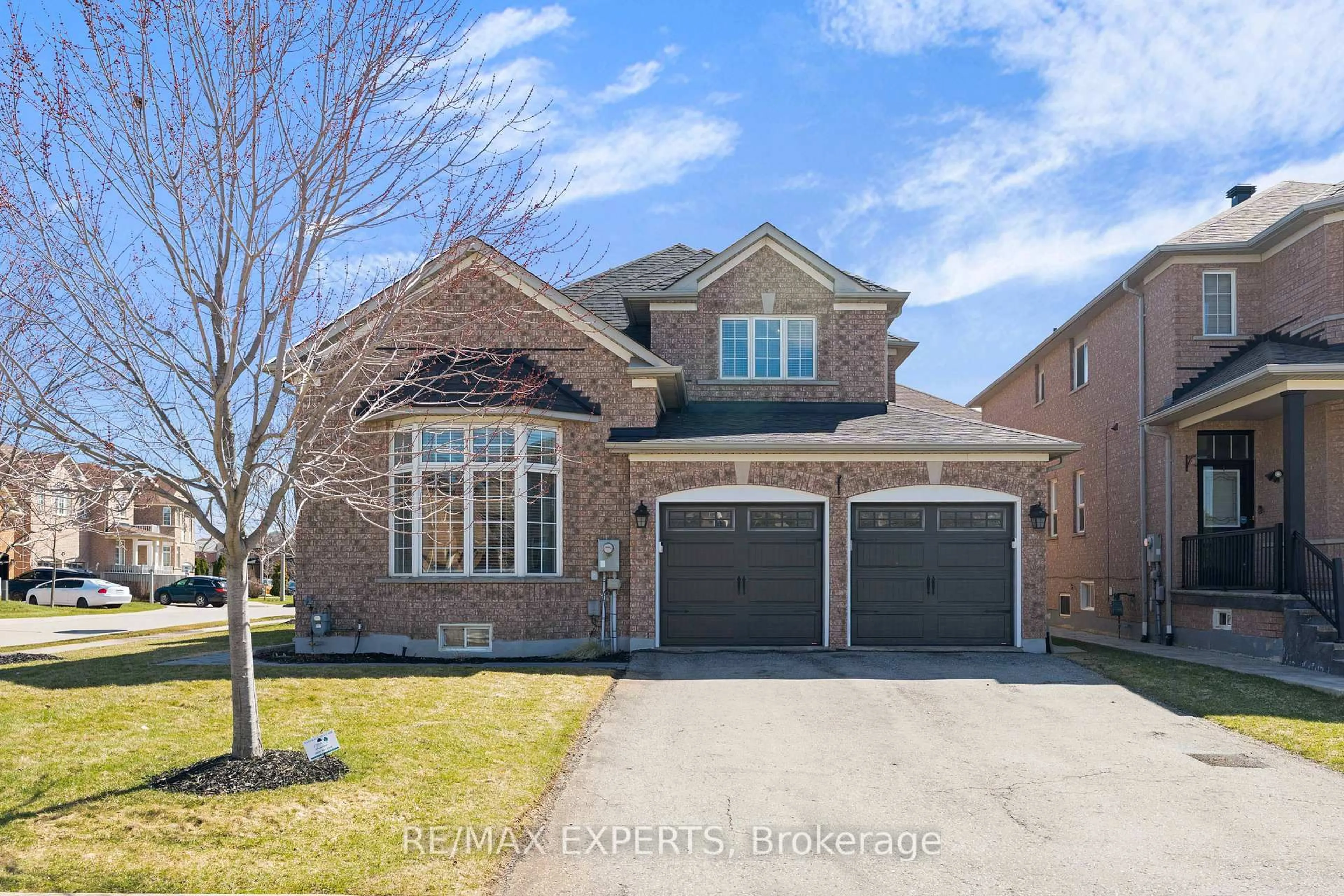 Home with brick exterior material, street for 52 Goreridge Cres, Brampton Ontario L6P 1P1