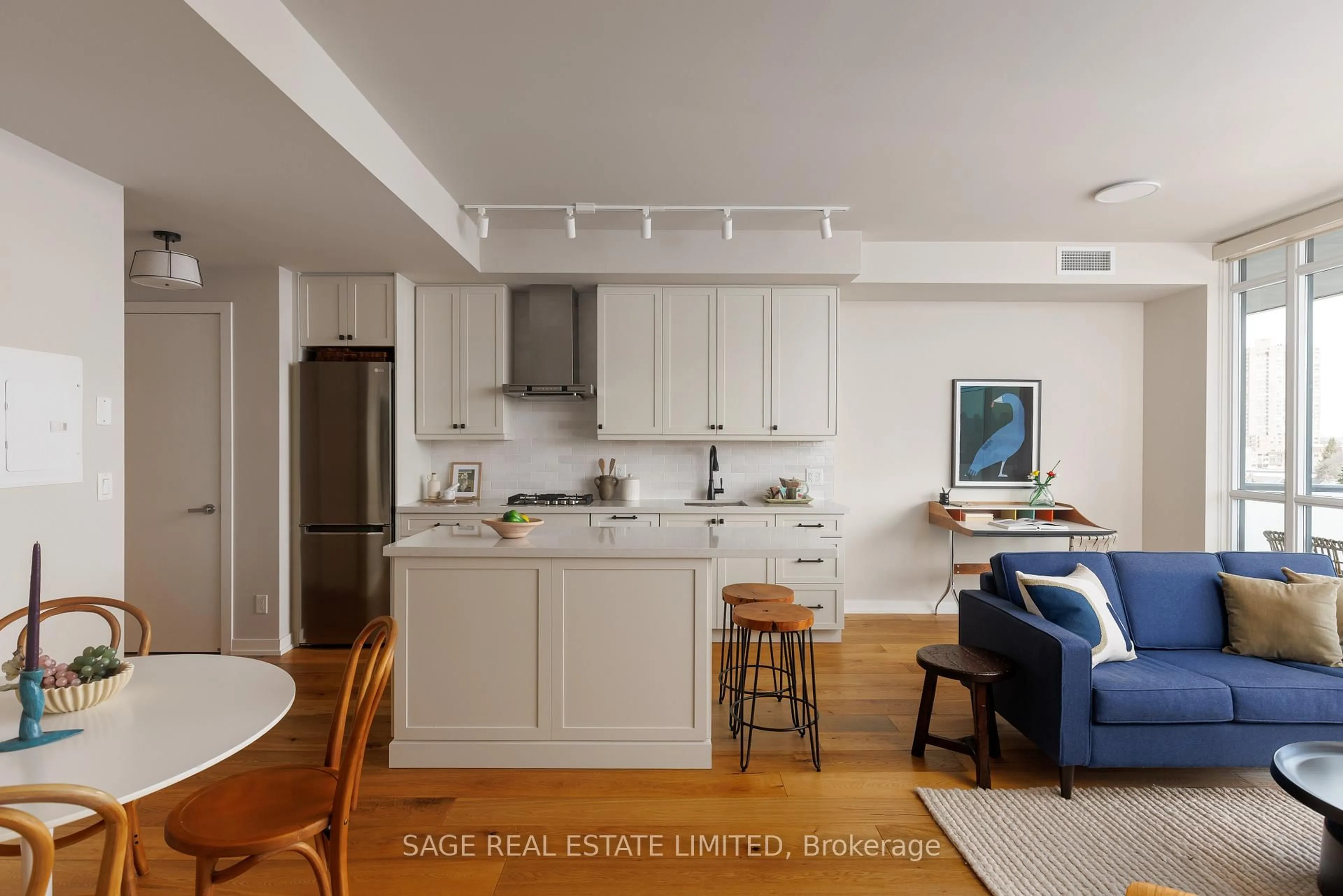 Open concept kitchen, wood/laminate floor for 36 Howard Park Ave #707, Toronto Ontario M6R 0A5