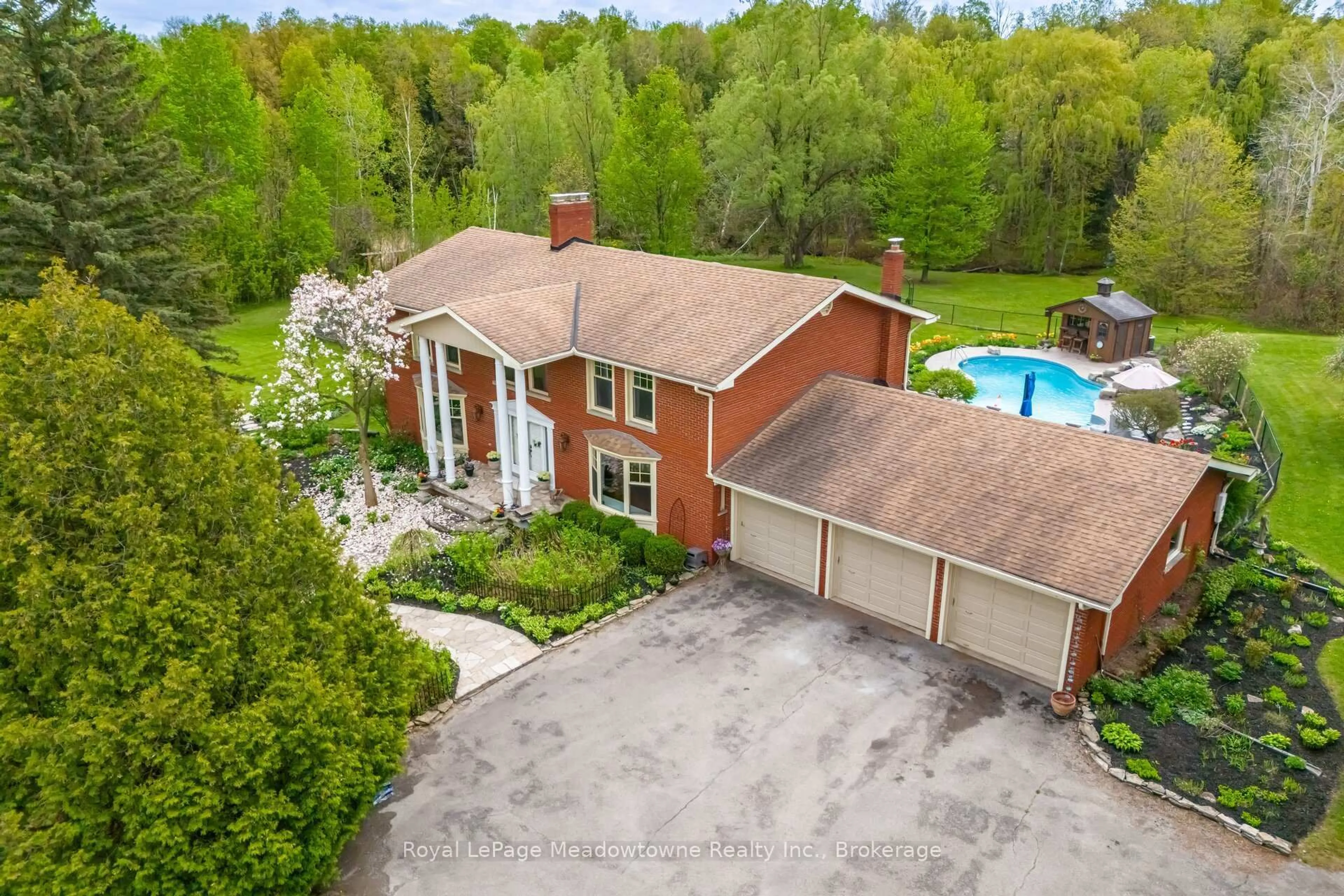A pic from outside/outdoor area/front of a property/back of a property/a pic from drone, water/lake/river/ocean view for 11302 Regional 25 Rd, Halton Hills Ontario L7J 2M1