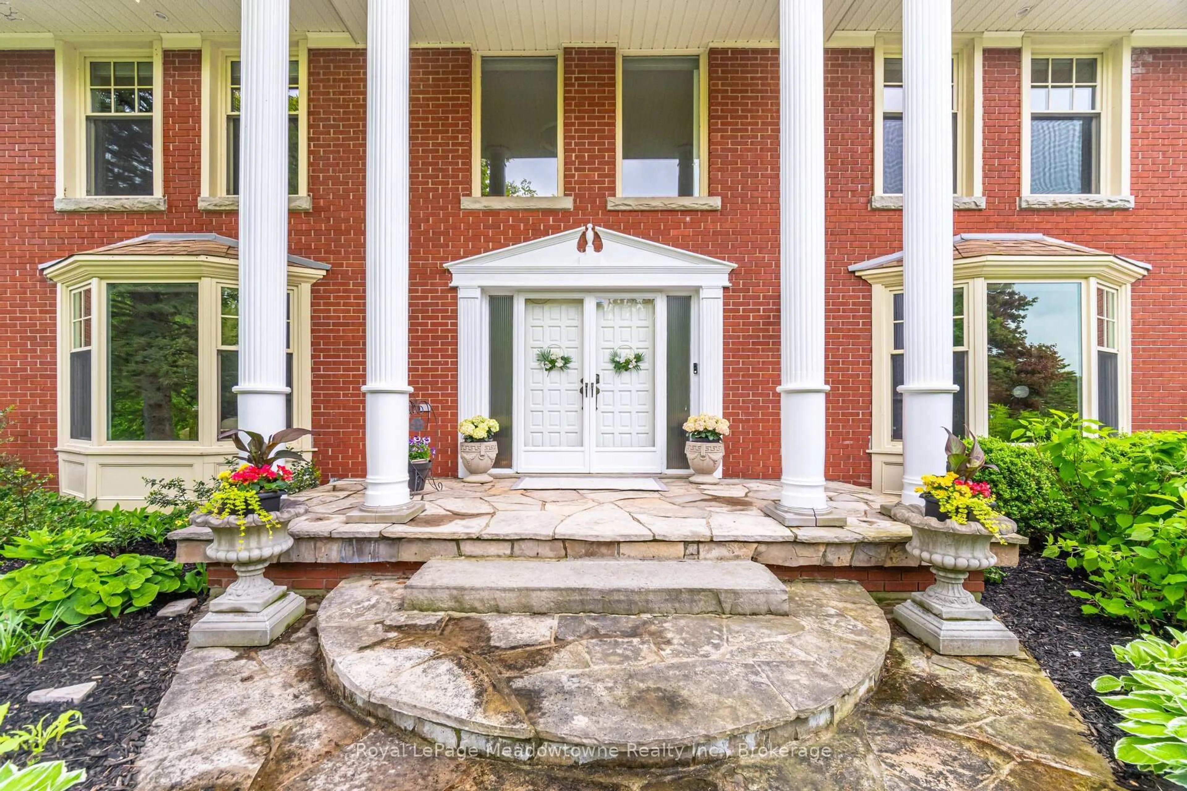 Home with brick exterior material, unknown for 11302 Regional 25 Rd, Halton Hills Ontario L7J 2M1