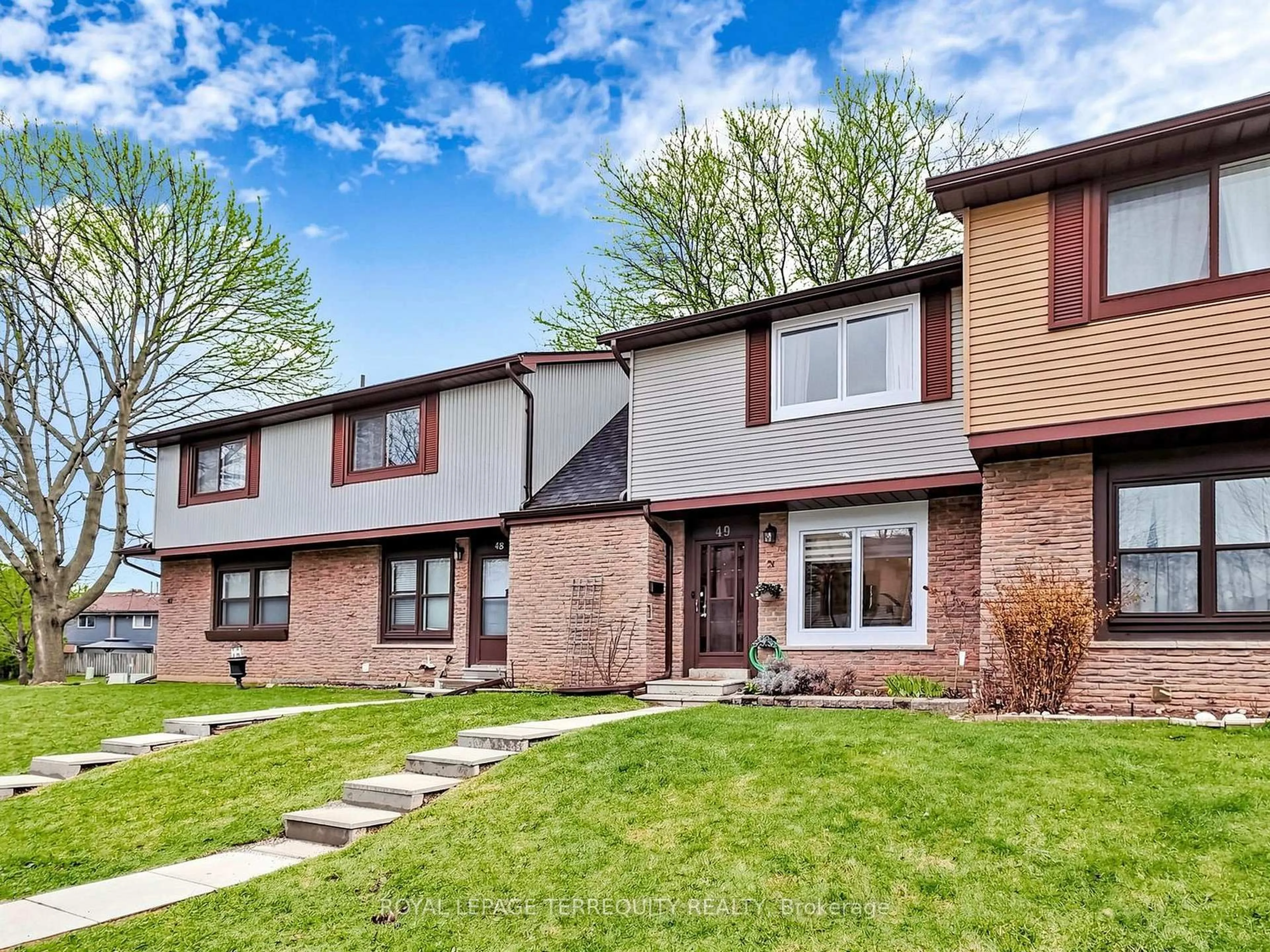 Home with brick exterior material, street for 6730 Falconer Dr #49, Mississauga Ontario L5N 1L5