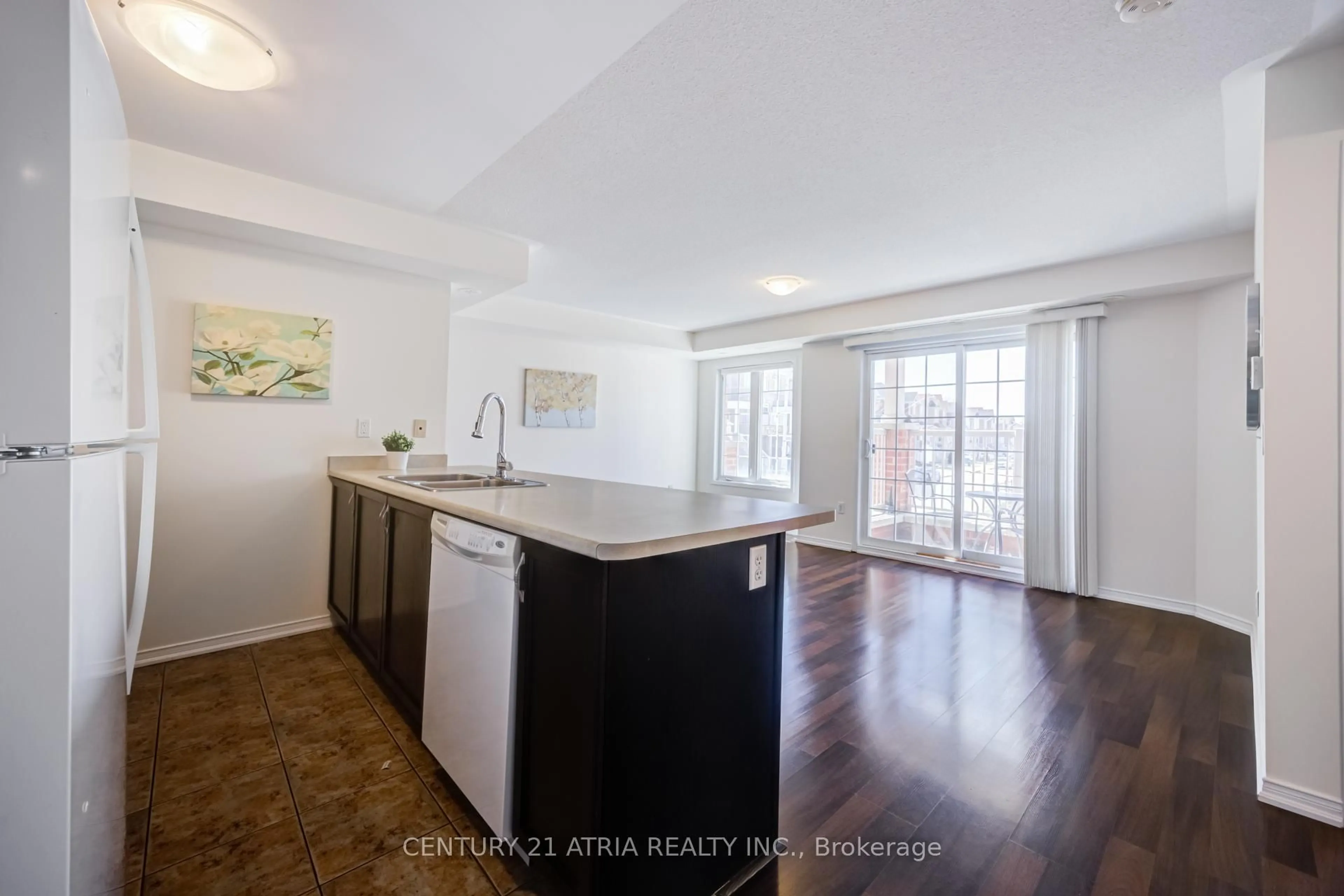 Open concept kitchen, wood/laminate floor for 129 Isaac Devins Blvd #5, Toronto Ontario M9M 0C4
