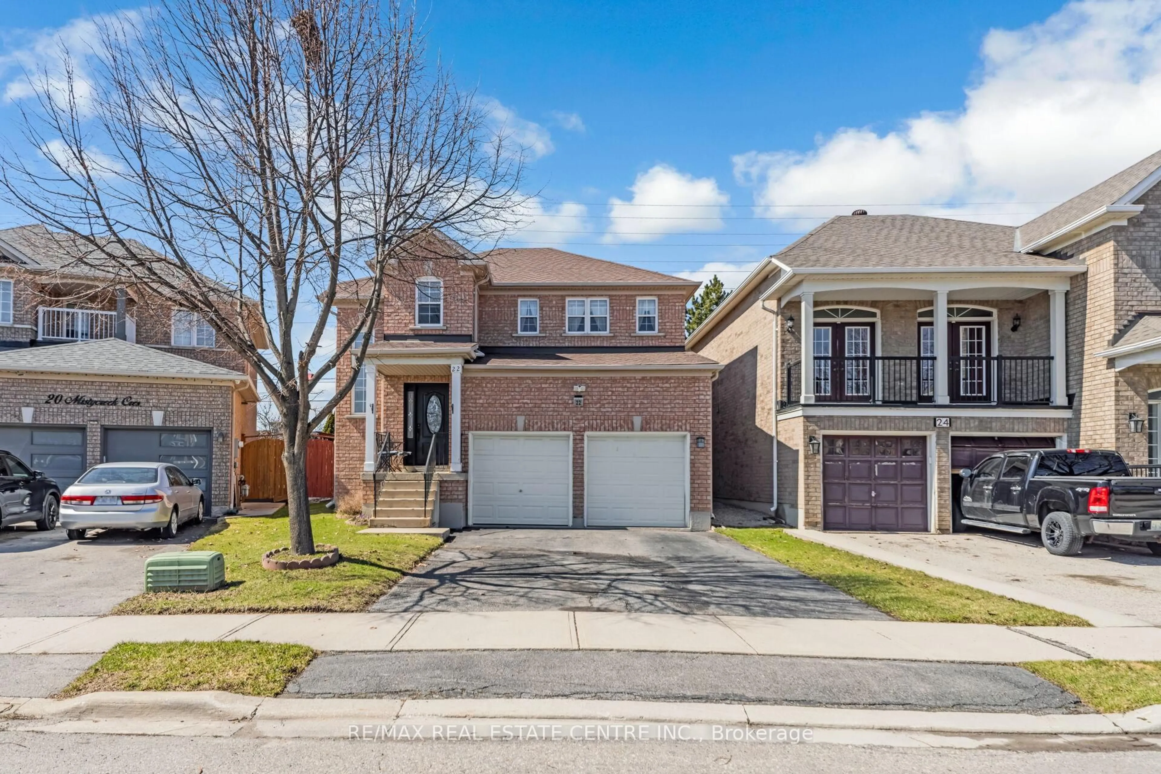 Home with brick exterior material, street for 22 Mistycreek Cres, Brampton Ontario L7A 3E8