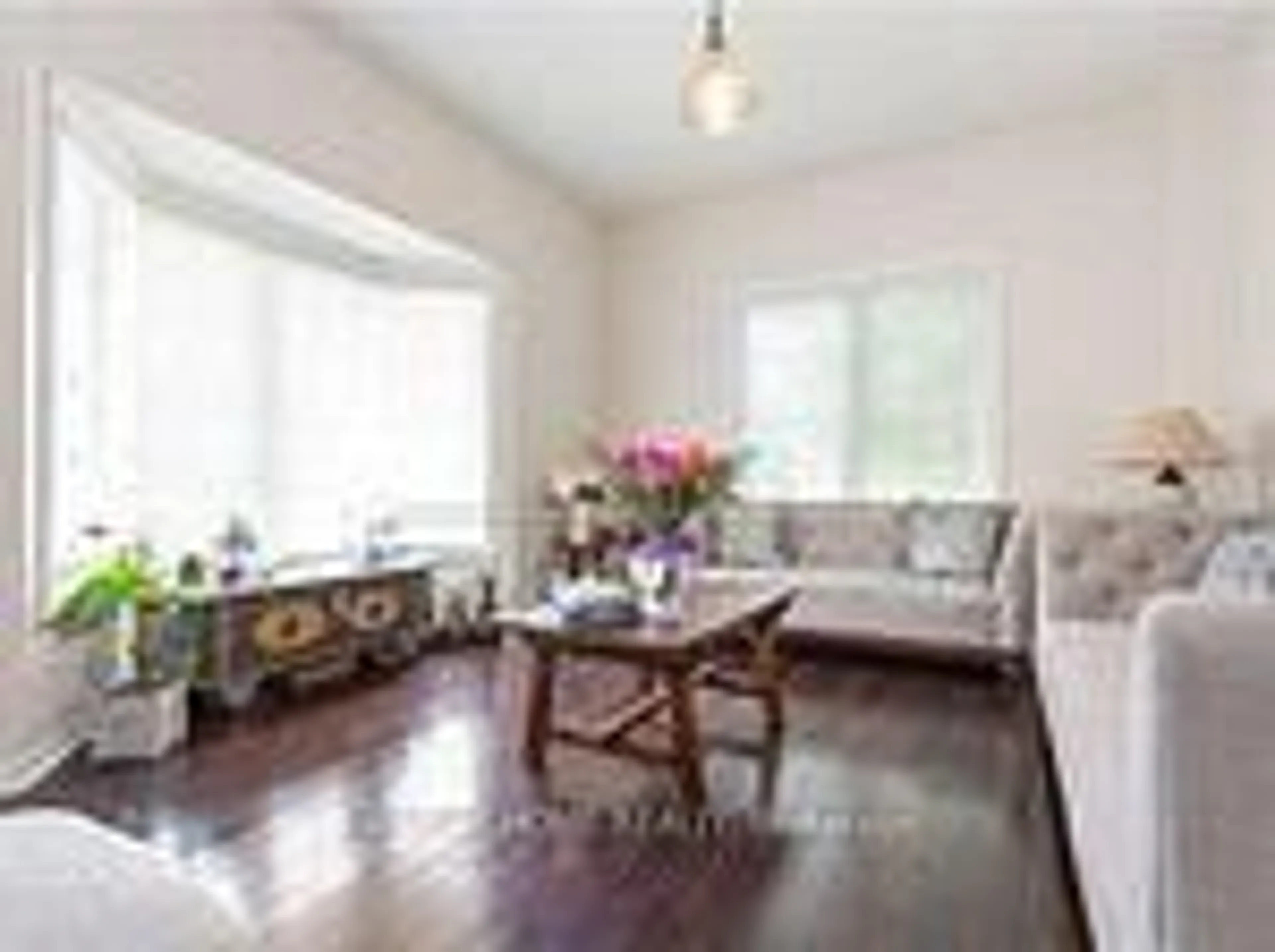 Living room with furniture, wood/laminate floor for 1074 Mccuaig Dr, Milton Ontario L9T 6T2