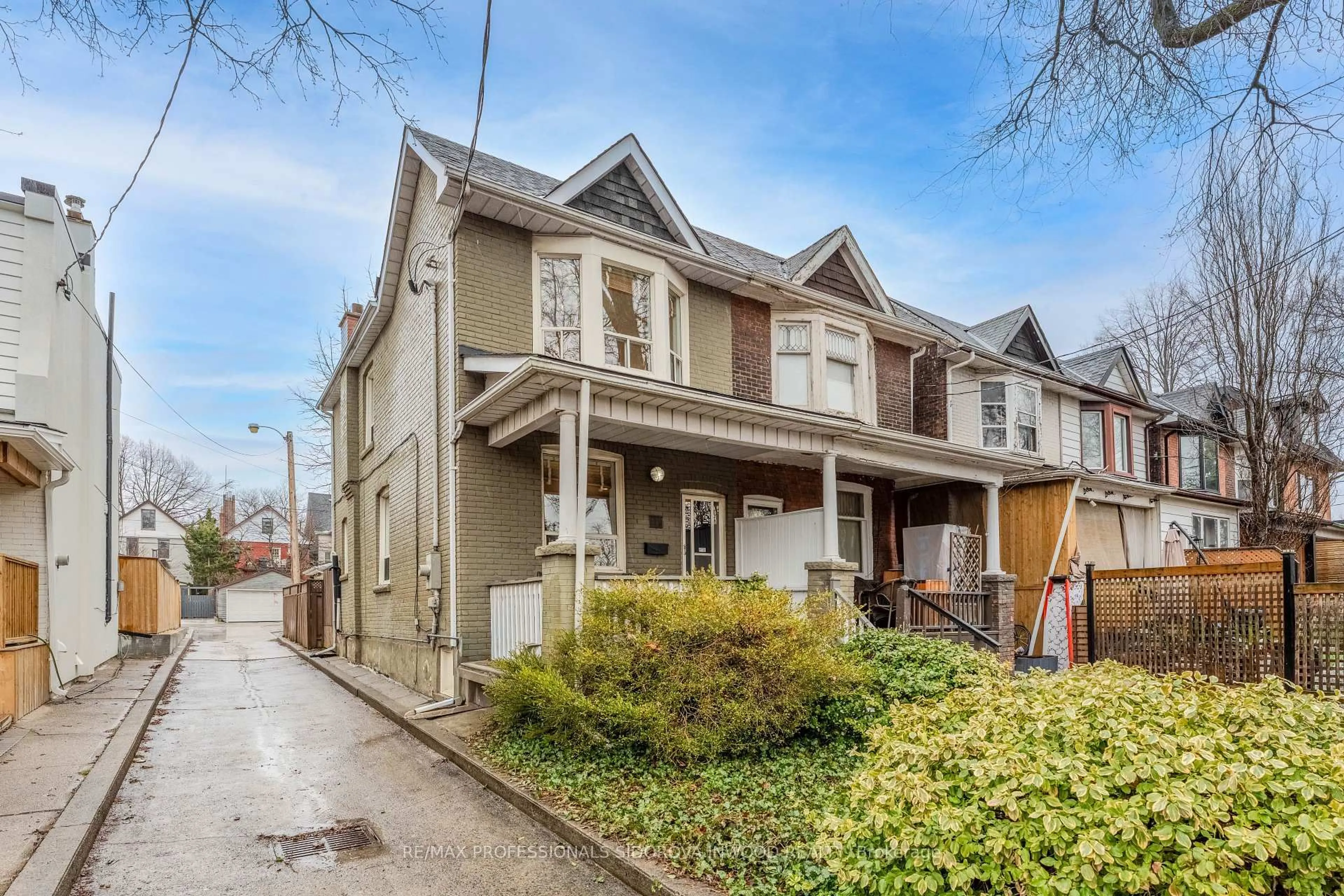 Home with brick exterior material, street for 413 Indian Grve, Toronto Ontario M6P 2H7