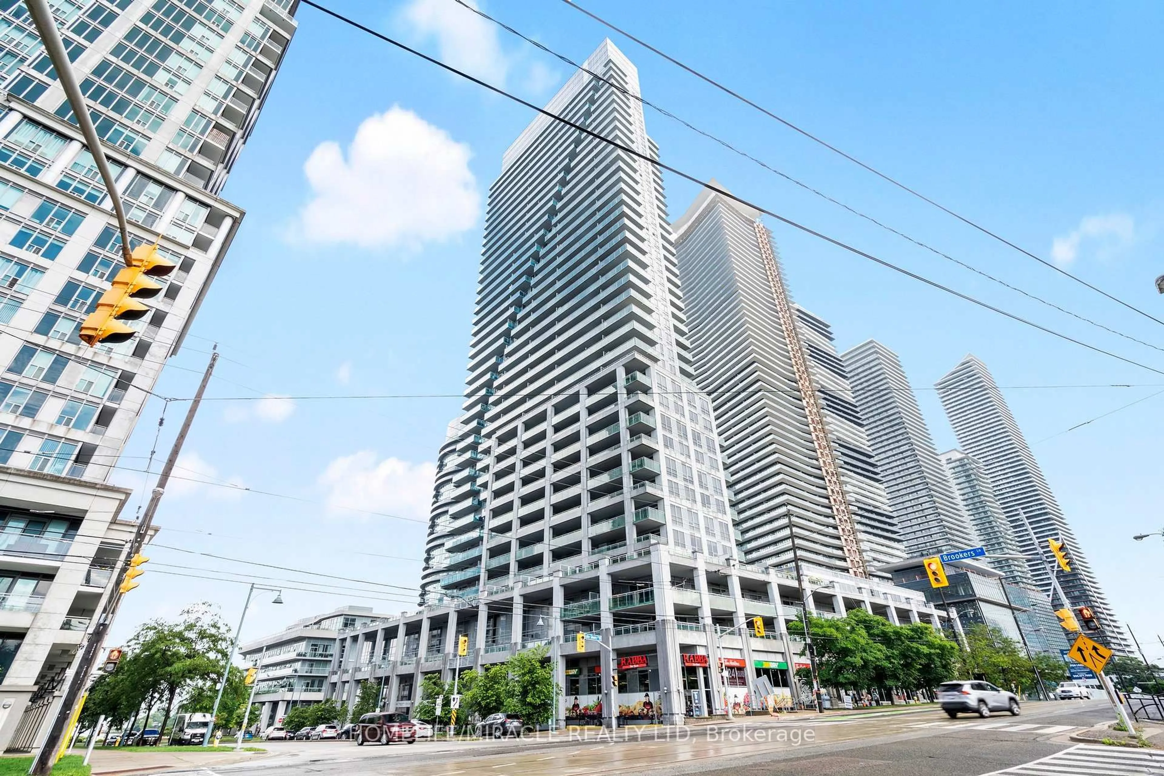 Patio, city buildings view from balcony for 16 Brookers Lane #2604, Toronto Ontario M8V 0A5