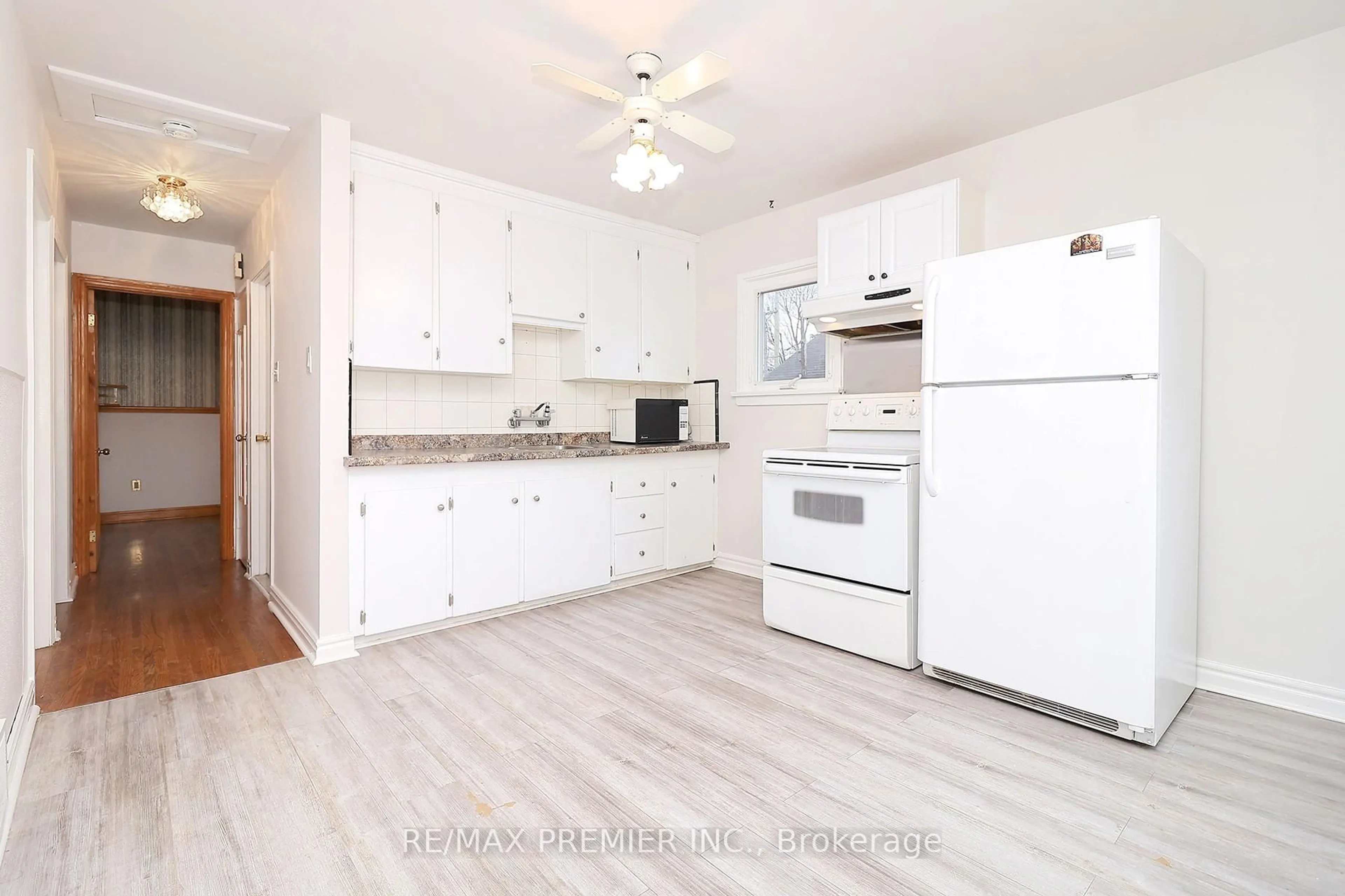 Standard kitchen, wood/laminate floor for 15 Boniface Ave, Toronto Ontario M9W 1T5