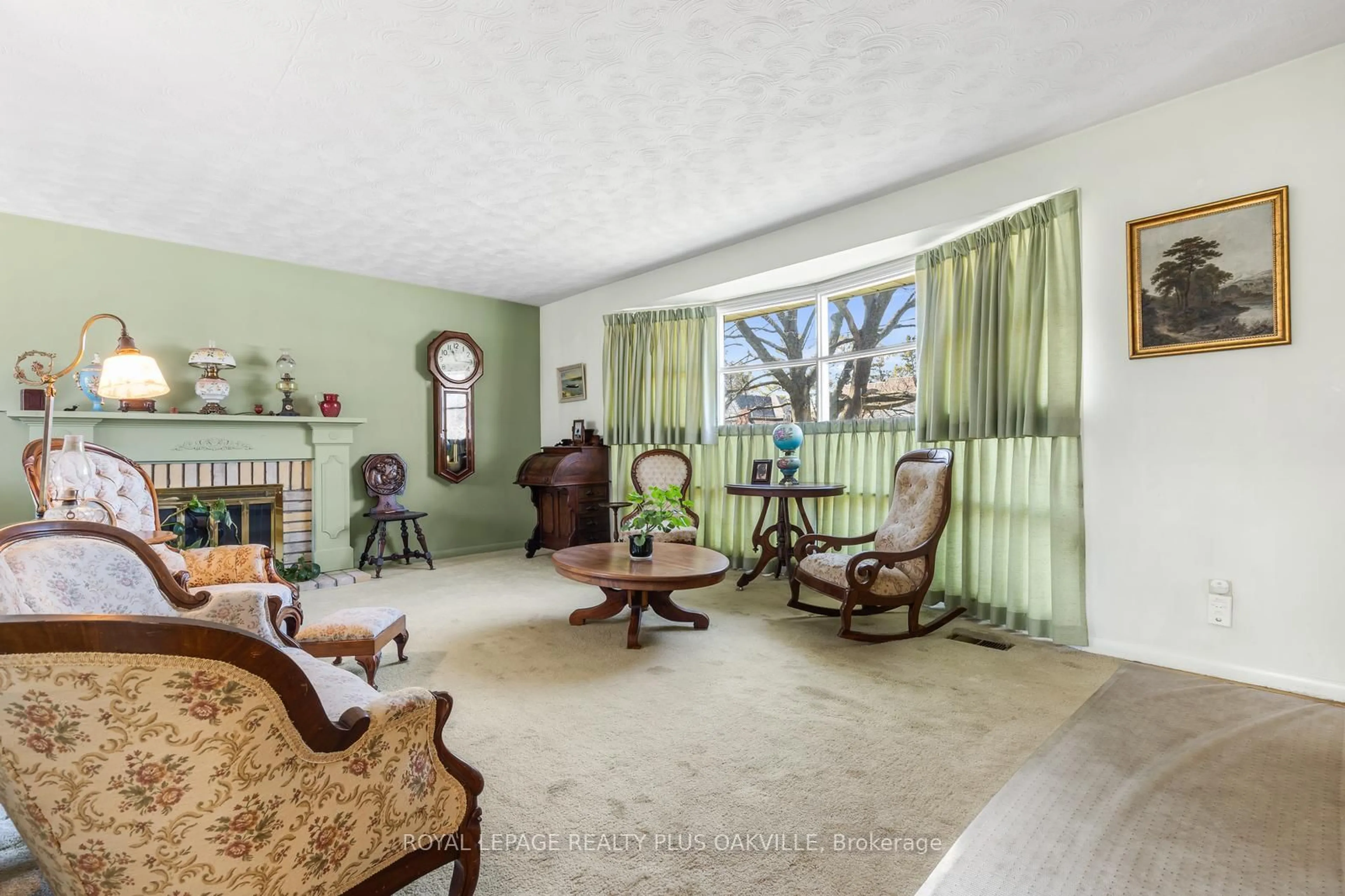 Living room with furniture, ceramic/tile floor for 227 Sandwell Dr, Oakville Ontario L6L 4P3