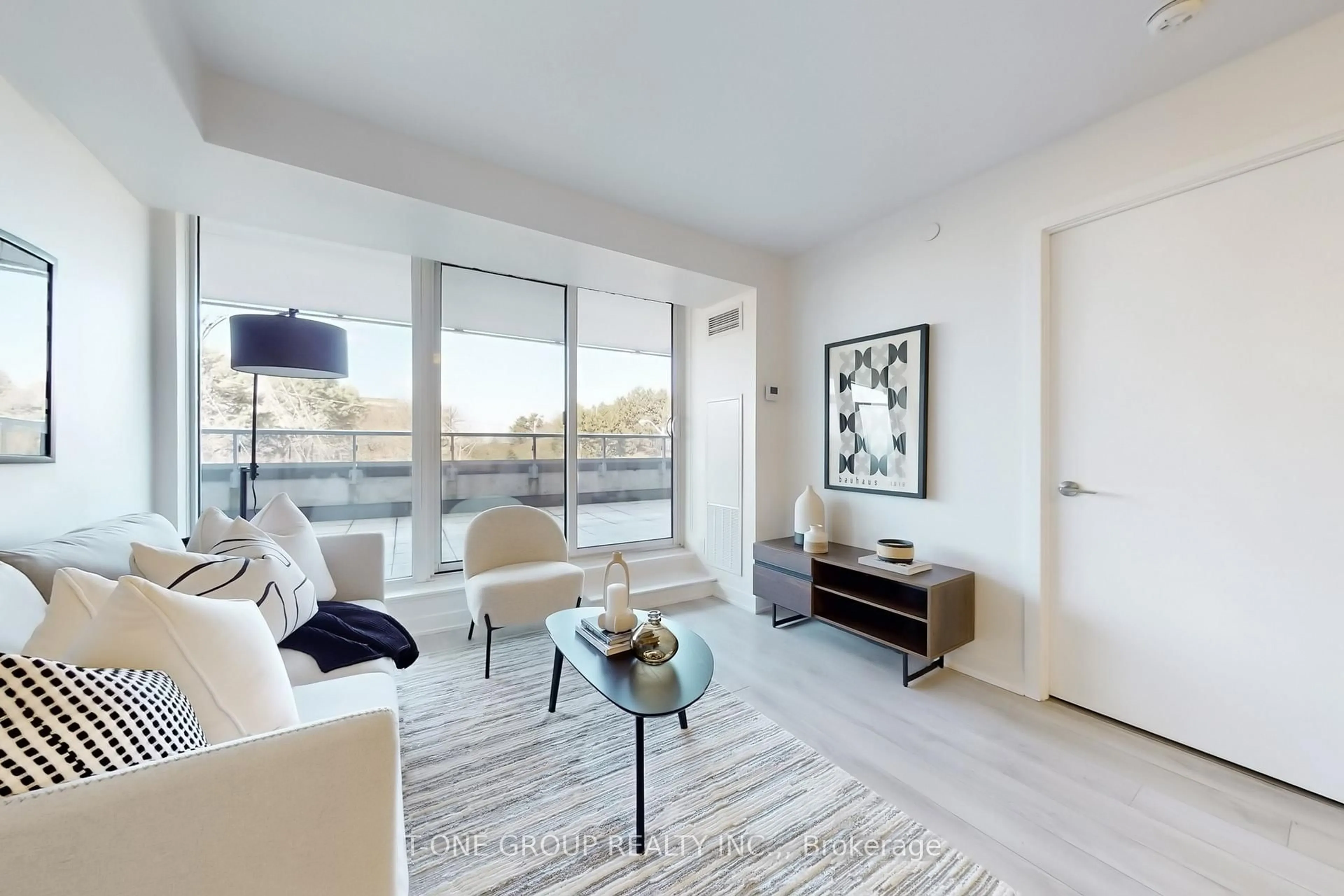 Living room with furniture, unknown for 160 Flemington Rd #313, Toronto Ontario M6A 1N6