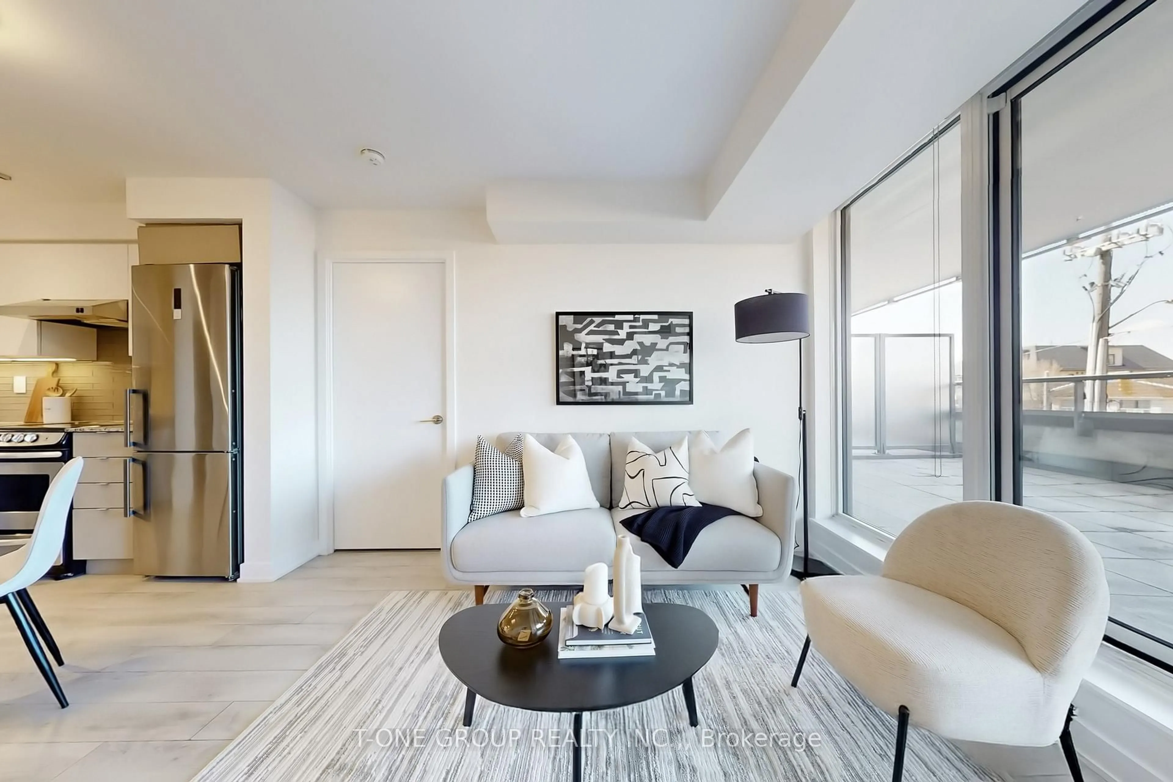 Living room with furniture, unknown for 160 Flemington Rd #313, Toronto Ontario M6A 1N6