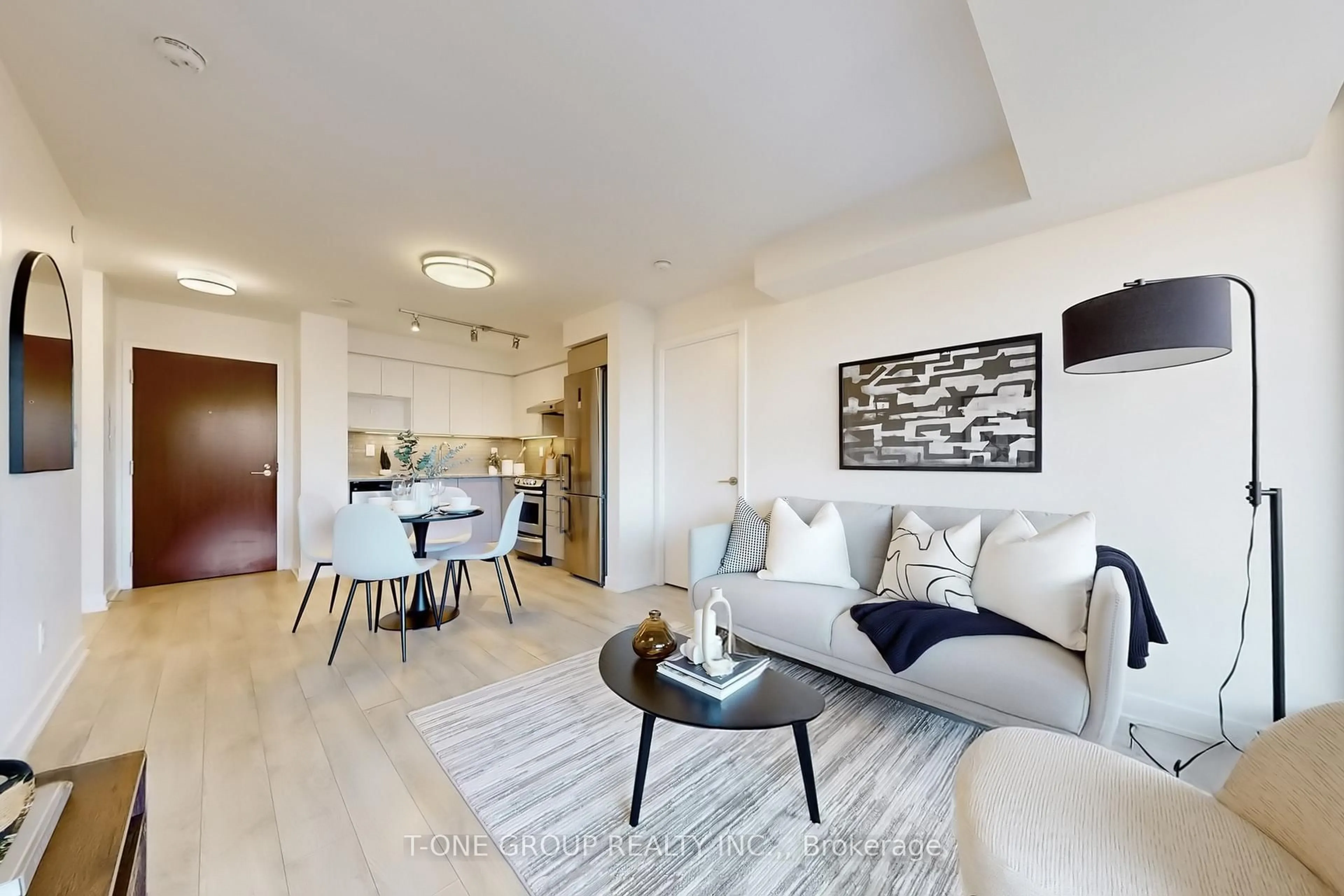 Living room with furniture, unknown for 160 Flemington Rd #313, Toronto Ontario M6A 1N6