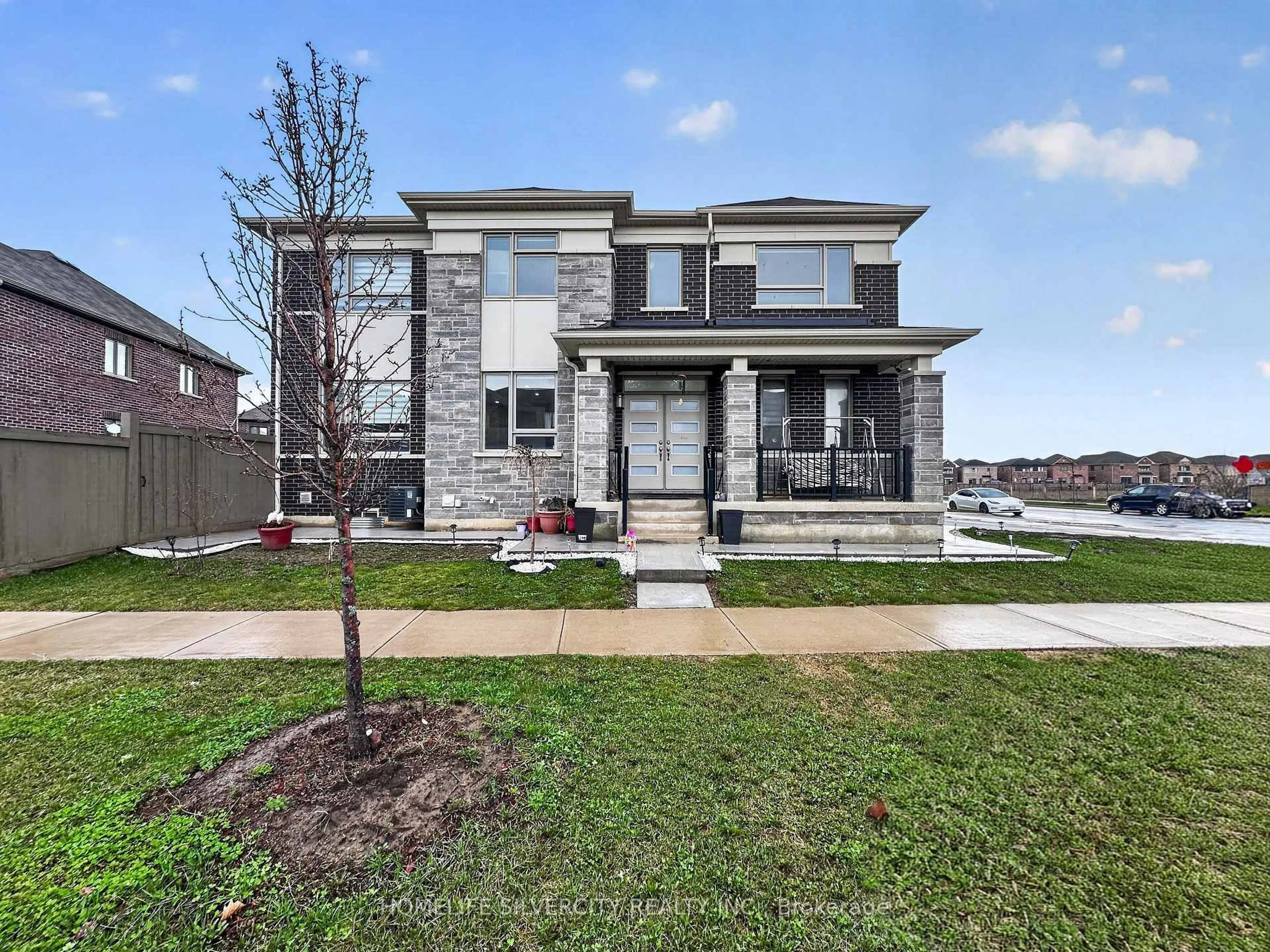 Home with brick exterior material, street for 1 Boothill Dr, Brampton Ontario L7A 5E5