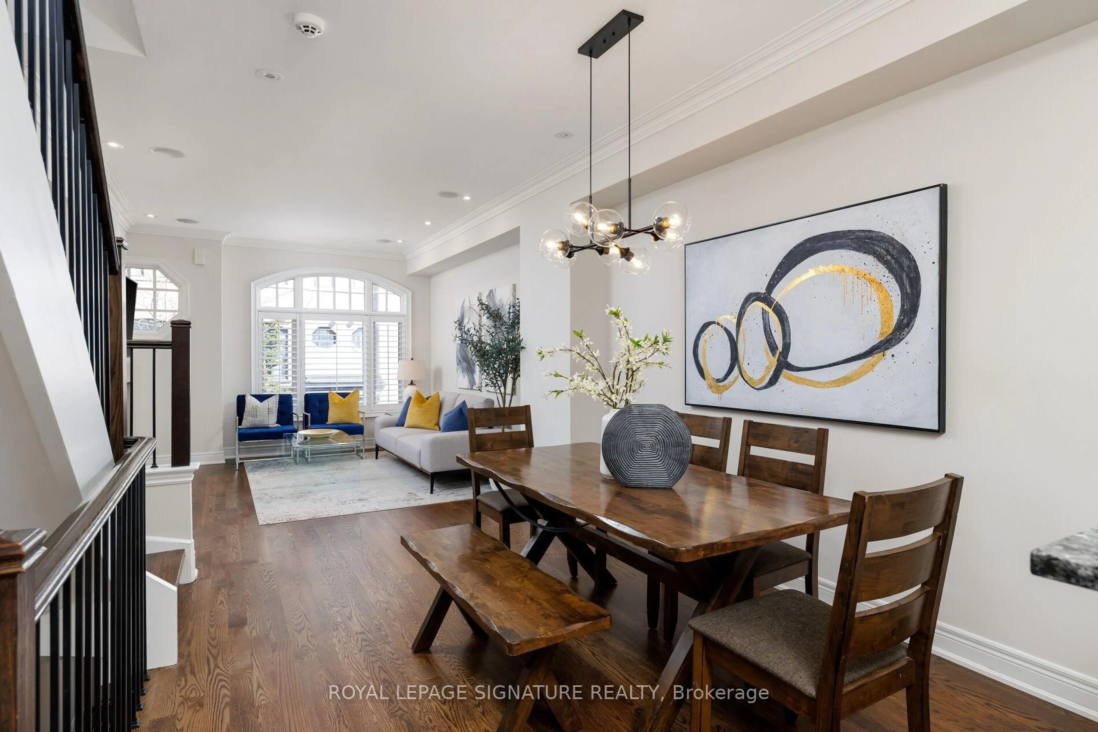 Dining room, wood/laminate floor for 59 Lobo Mews, Toronto Ontario M8Z 0B2