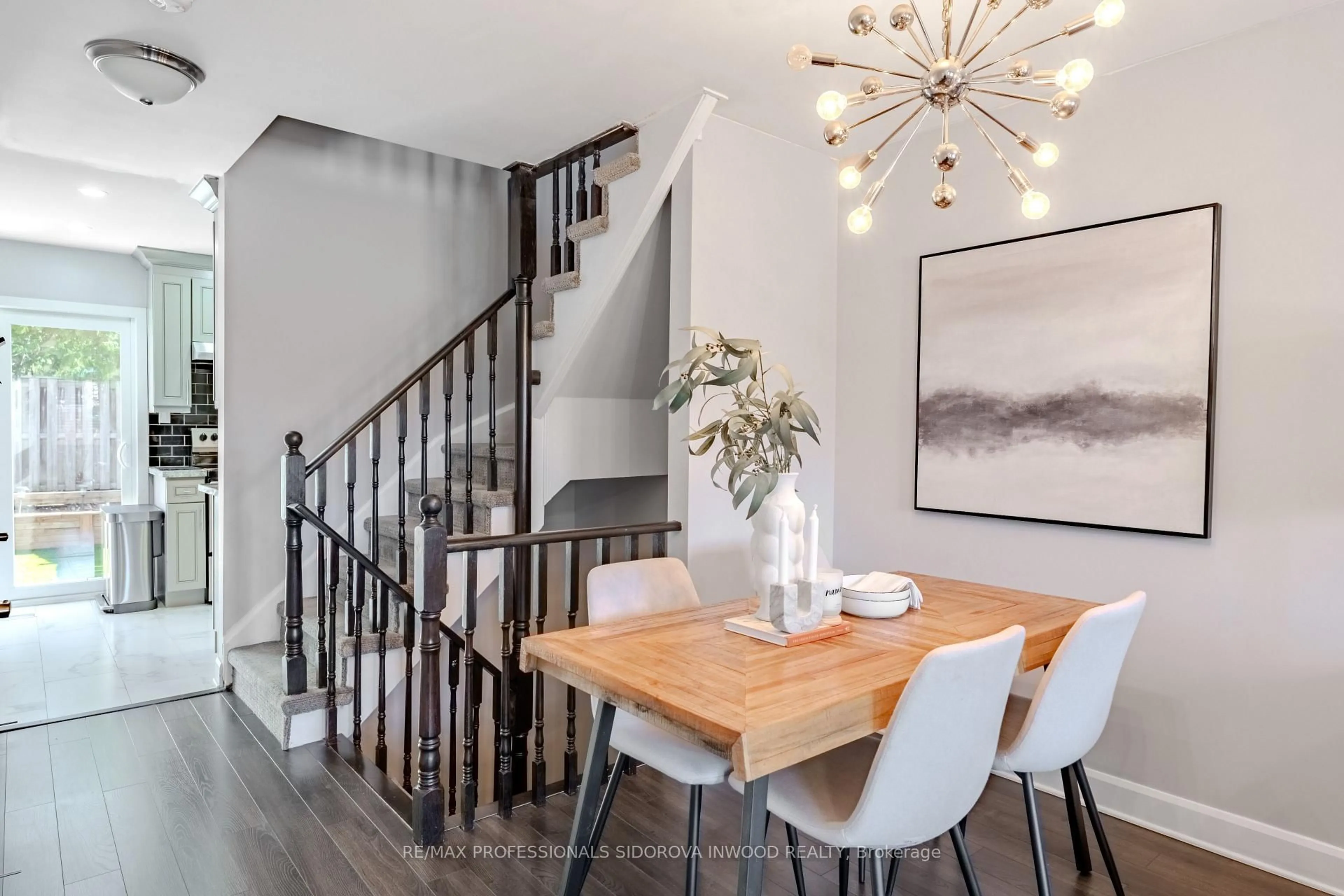 Dining room, wood/laminate floor for 224 Rosemount Ave #20, Toronto Ontario M9N 1M8