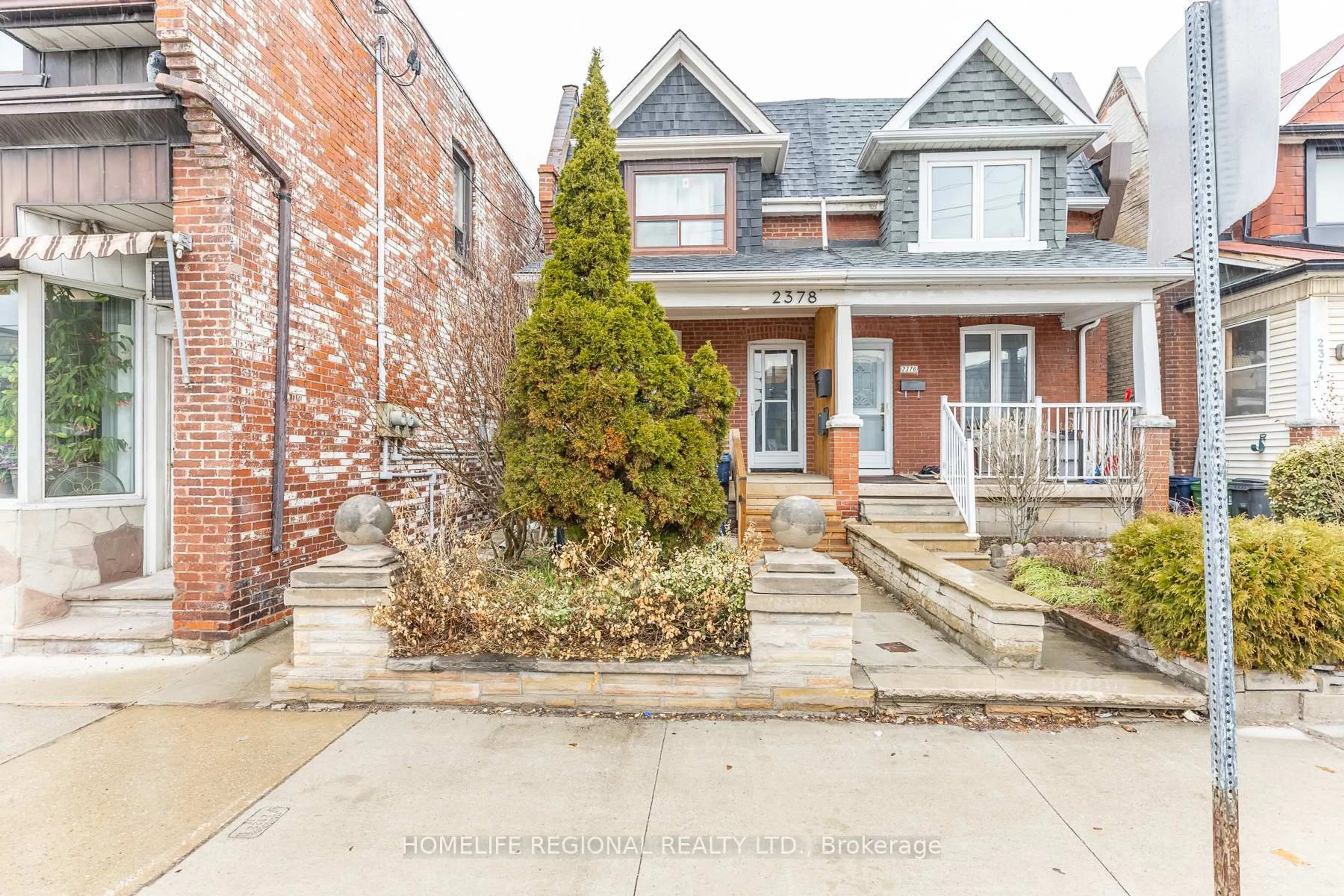 Home with brick exterior material, street for 2378 St Clair Ave, Toronto Ontario M6N 1K8