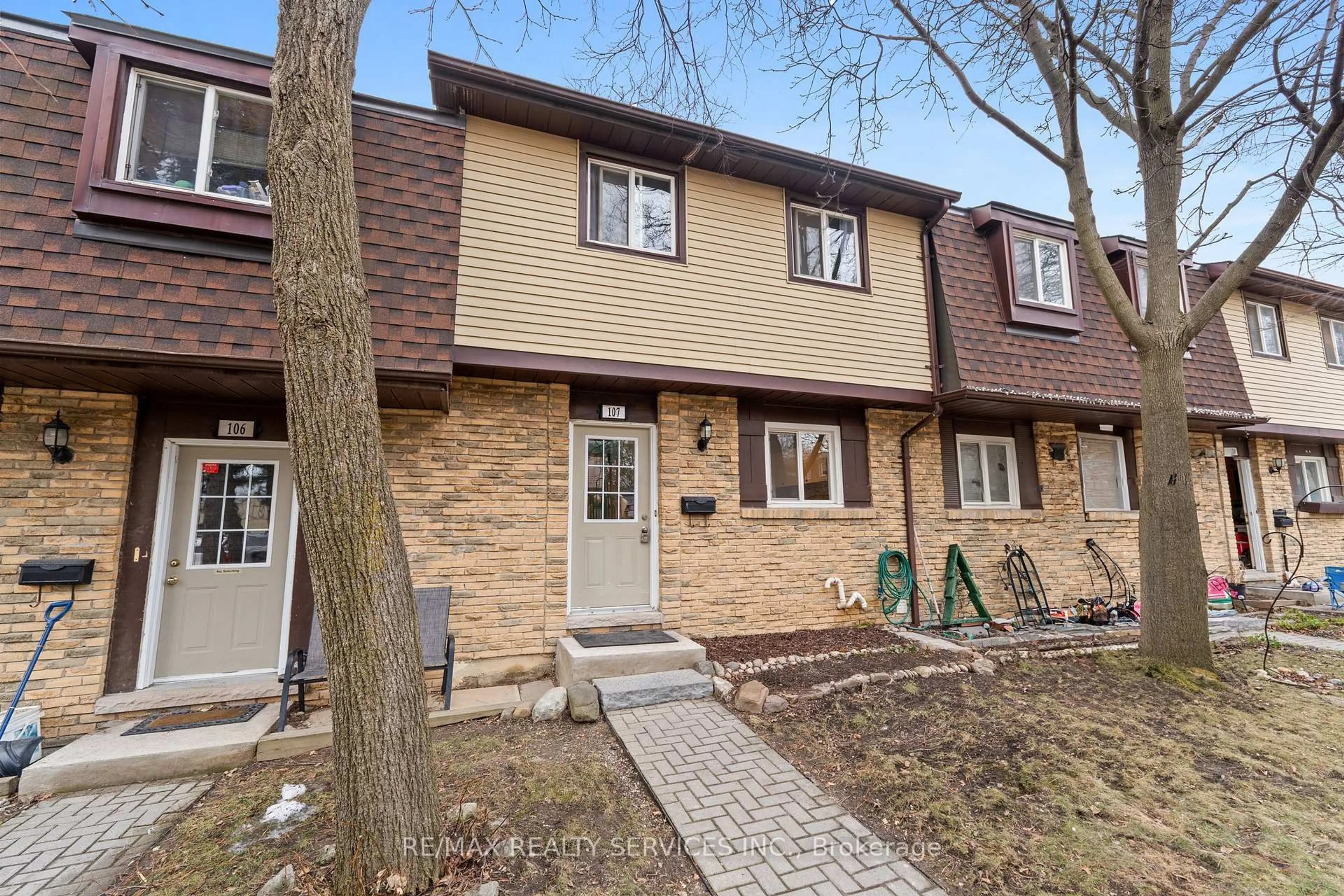 Home with brick exterior material, street for 45 Hansen Rd #107, Brampton Ontario L6V 3P6