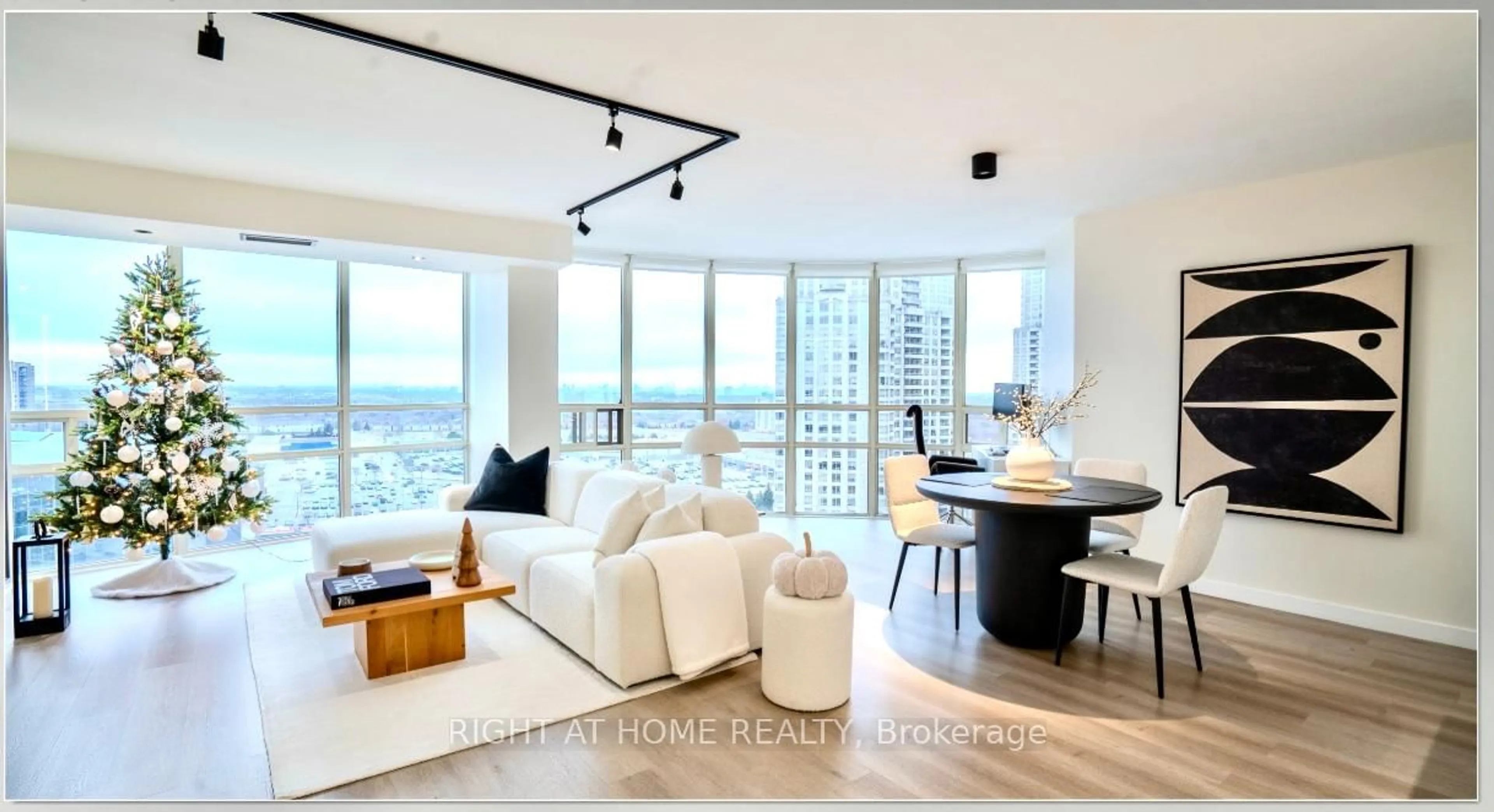 Living room with furniture, unknown for 50 Eglinton Ave #1705, Mississauga Ontario L5R 3P5