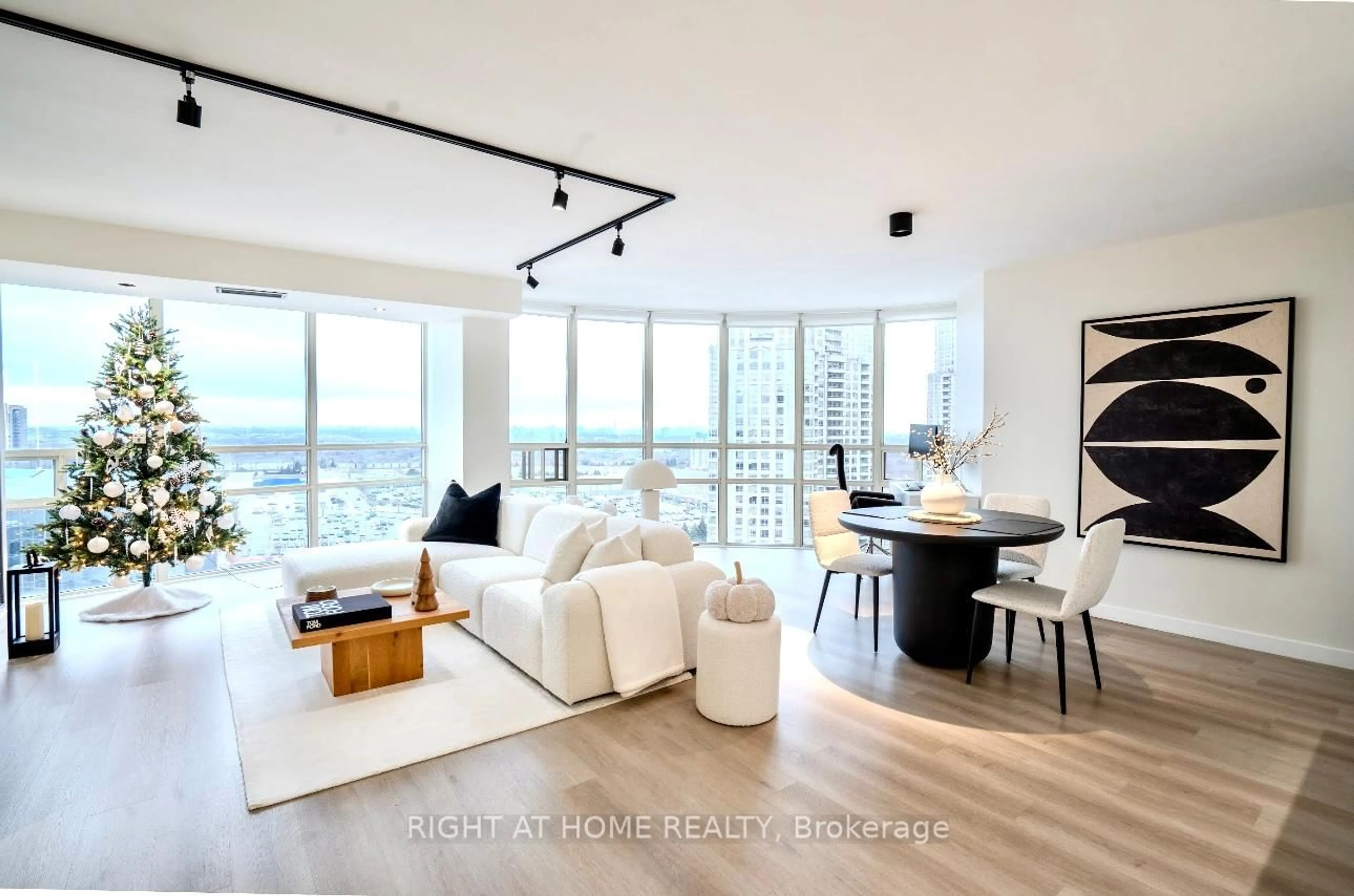 Living room with furniture, unknown for 50 Eglinton Ave #1705, Mississauga Ontario L5R 3P5