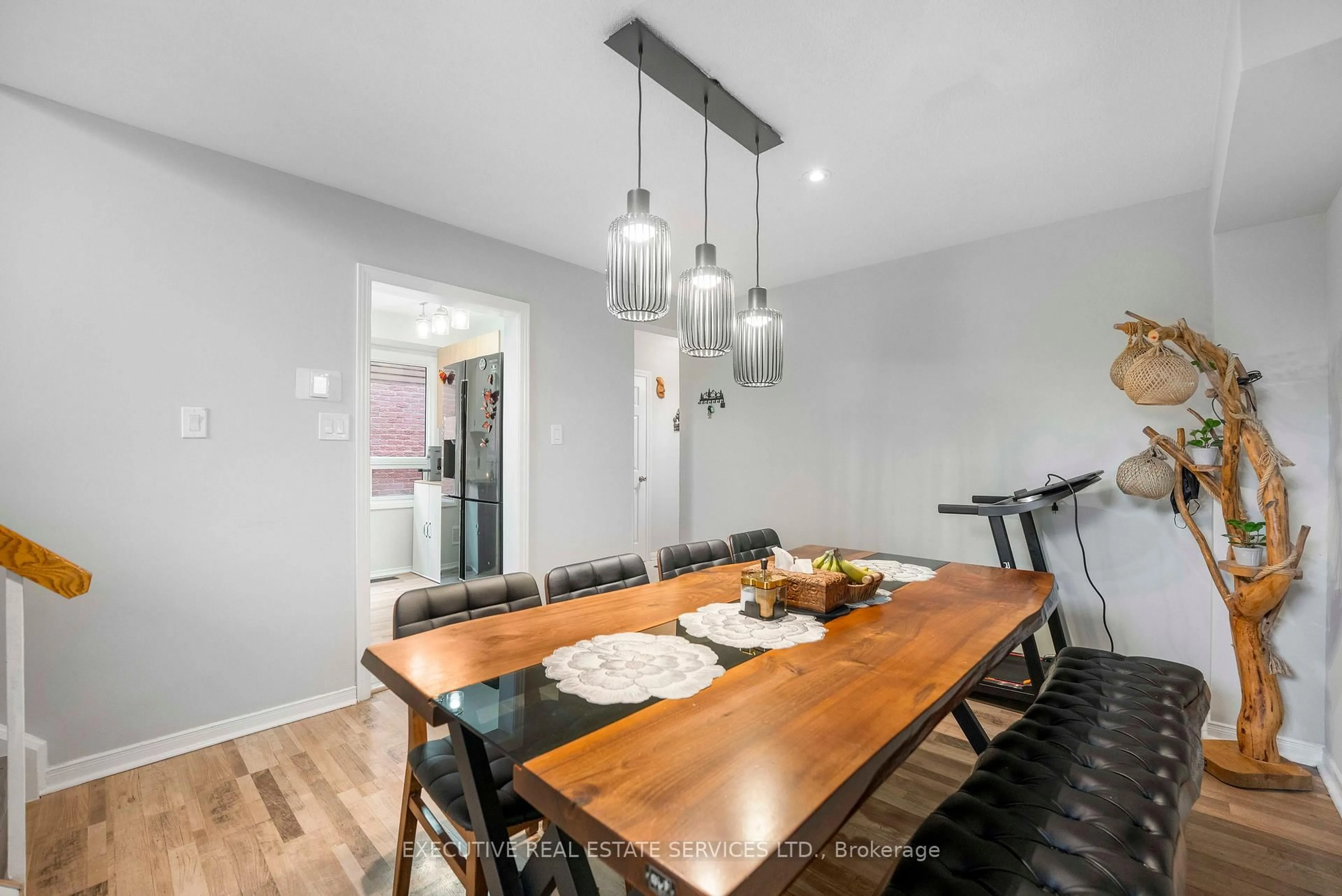 Dining room, wood/laminate floor for 21 Garden Ave, Brampton Ontario L6X 1M4