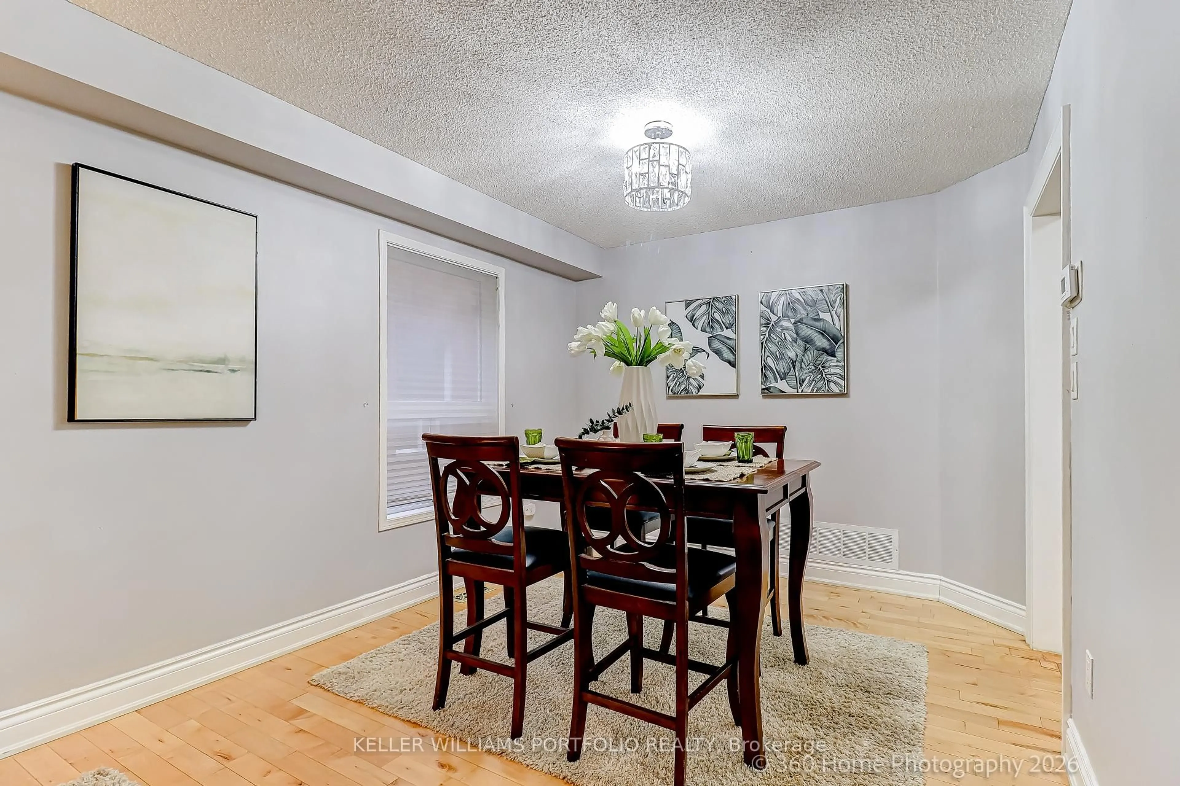 Dining room, wood/laminate floor for 45 Olympia Cres, Brampton Ontario L6X 4W2